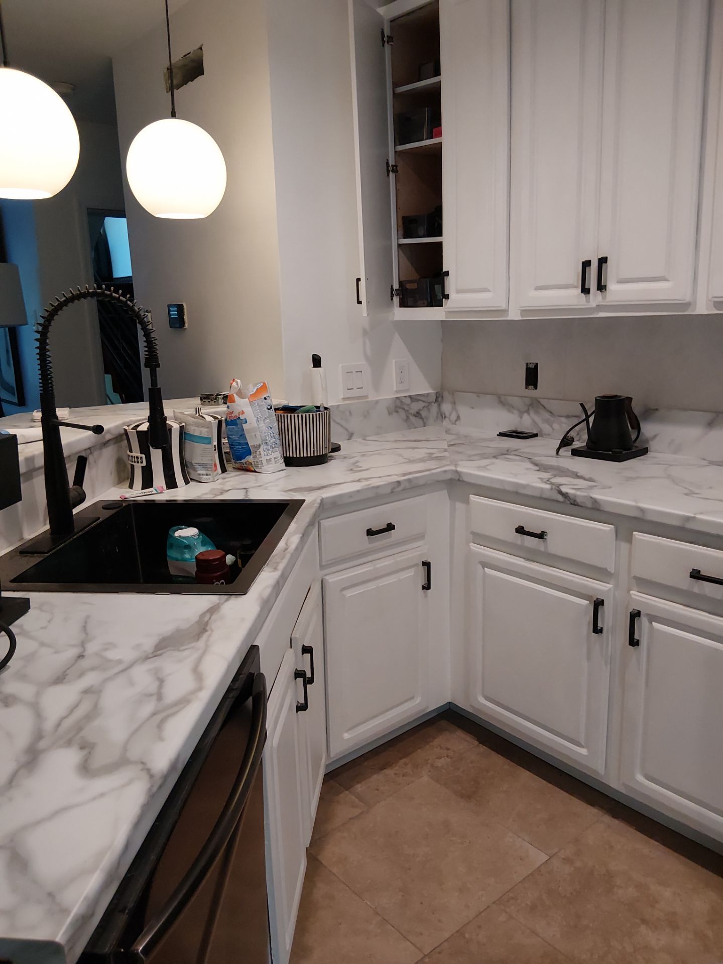 Kitchen Refresh and Hardwood Floor Restoration in Clayton by Legendary Services Company LLC.