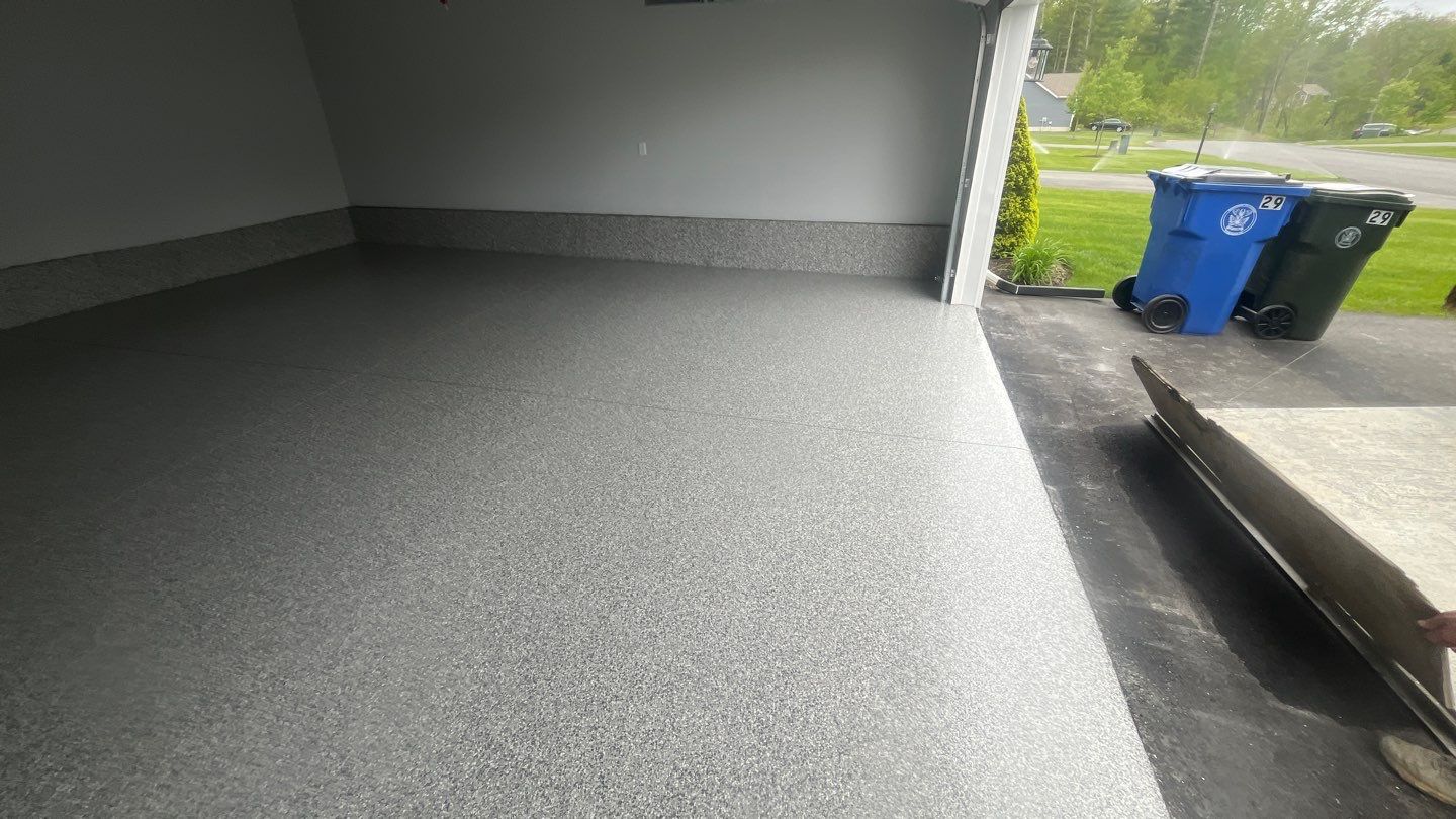 Garage in Londonderry, NH 03053 by Symphony Concrete Coatings