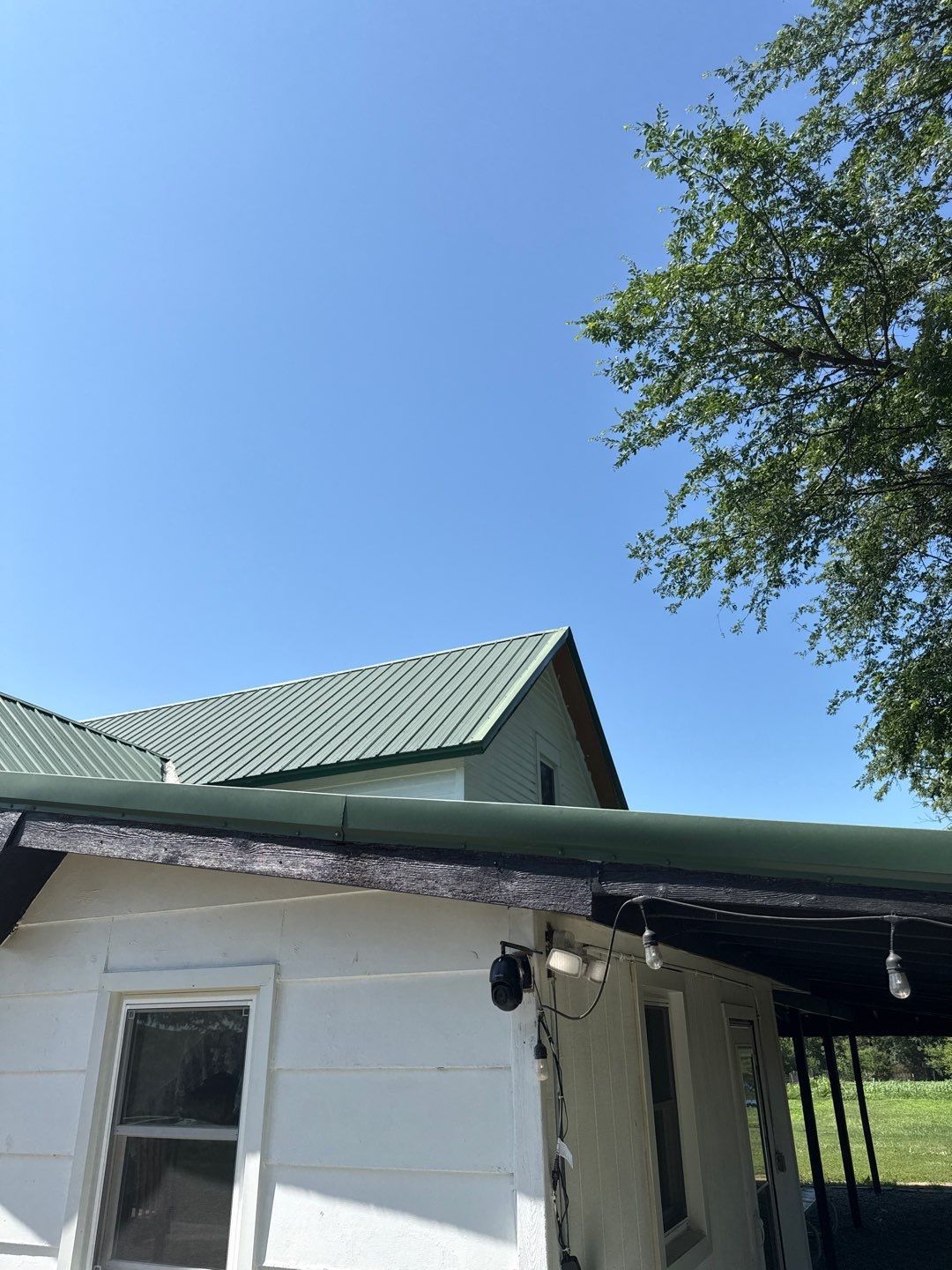 Standing-Seam Metal Roof and Vinyl Siding in Pender, NE by Crows Roofing LLC
