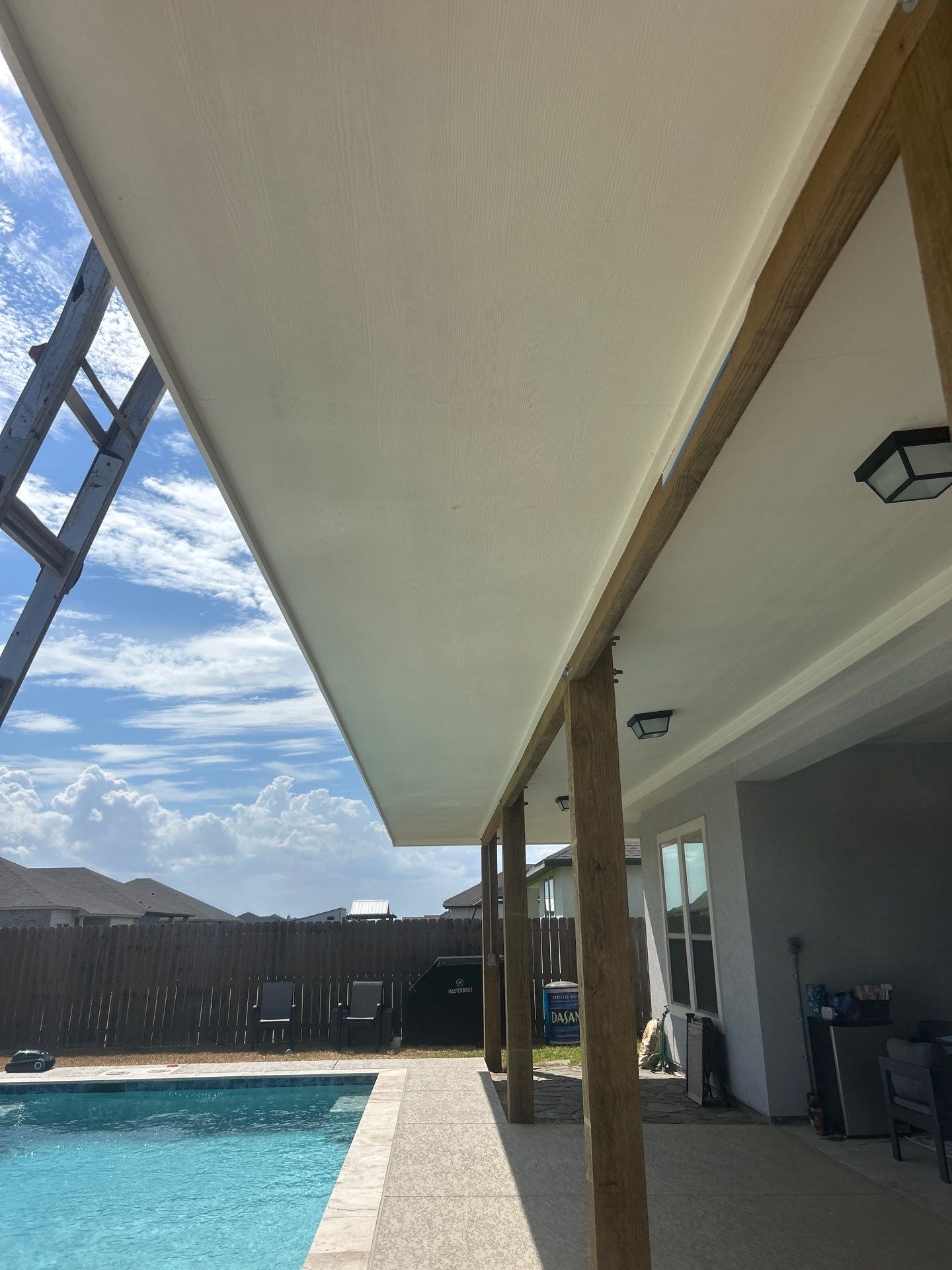 Patio Pool Cover by Bayfront Roofing and Construction