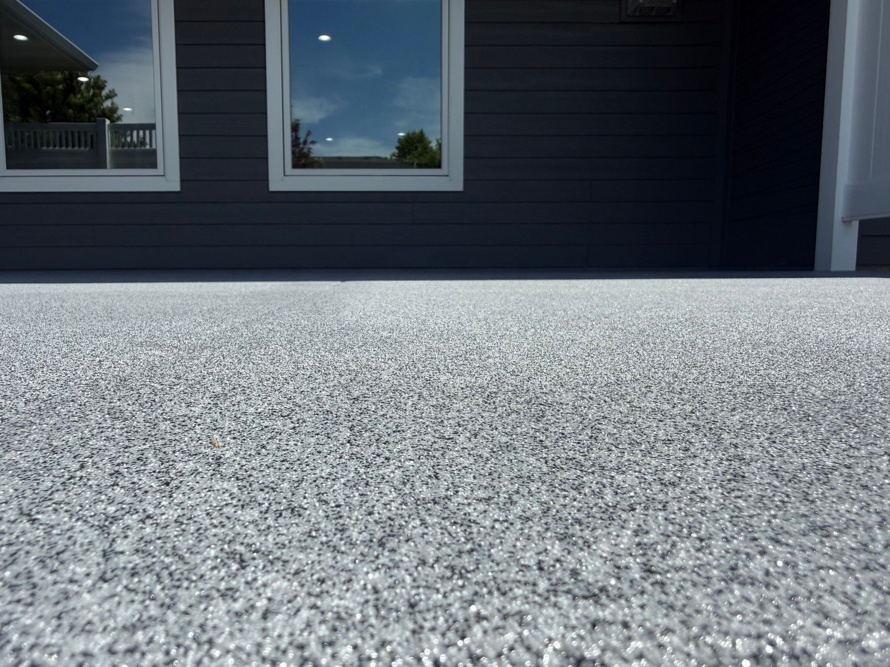 Polyurea Patio Floor Coating in Starry Evening for Sioux Falls Home by Select Painting, Coatings & Garage Cabinets