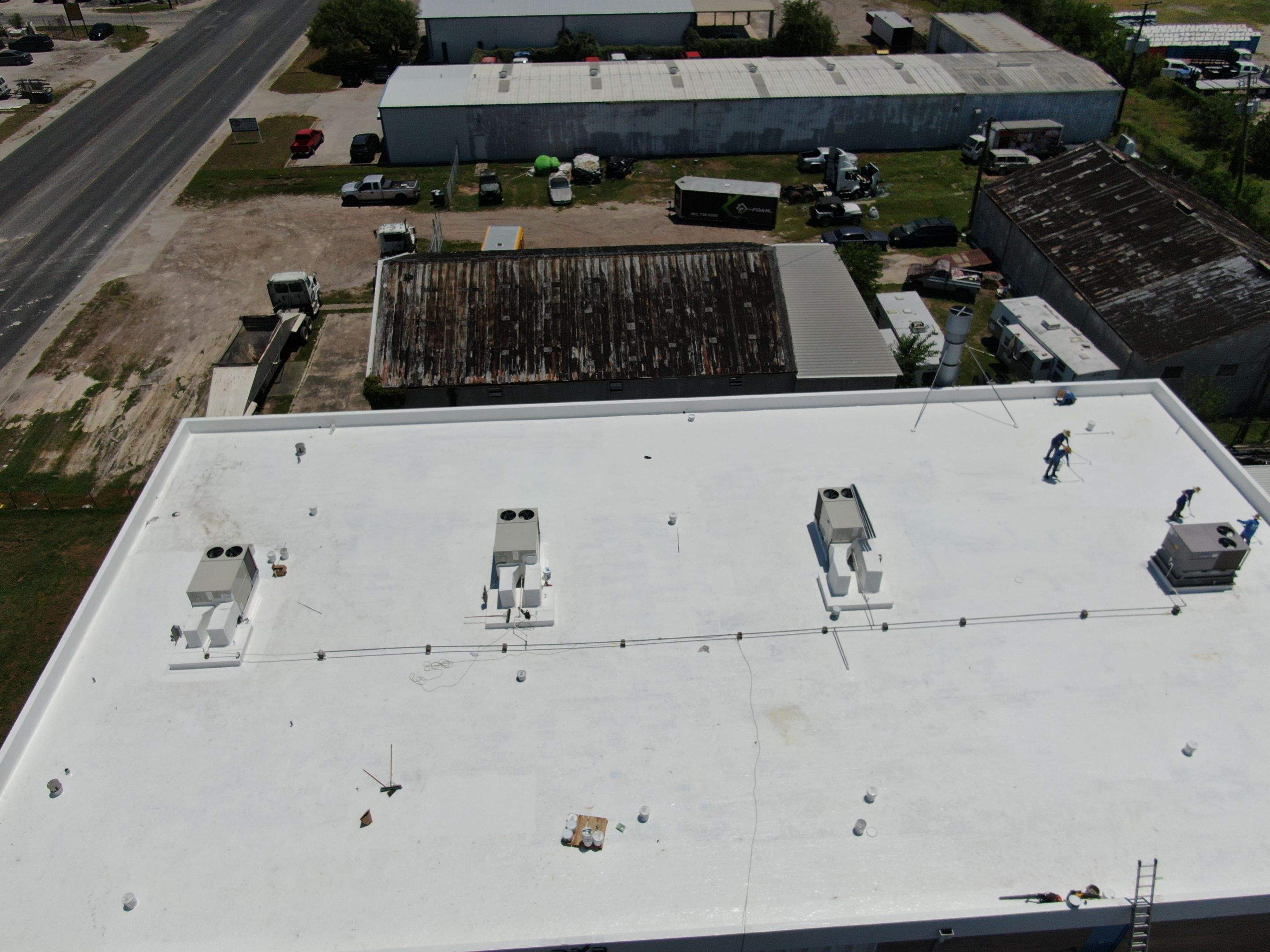 Dirty leaking Gravel Roof by Bayfront Roofing and Construction