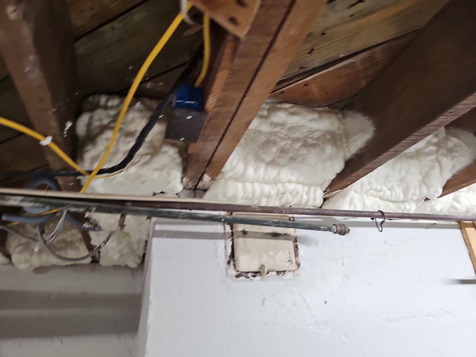 Attic Insulation using open cell spray foam by NYS Foam & Energy