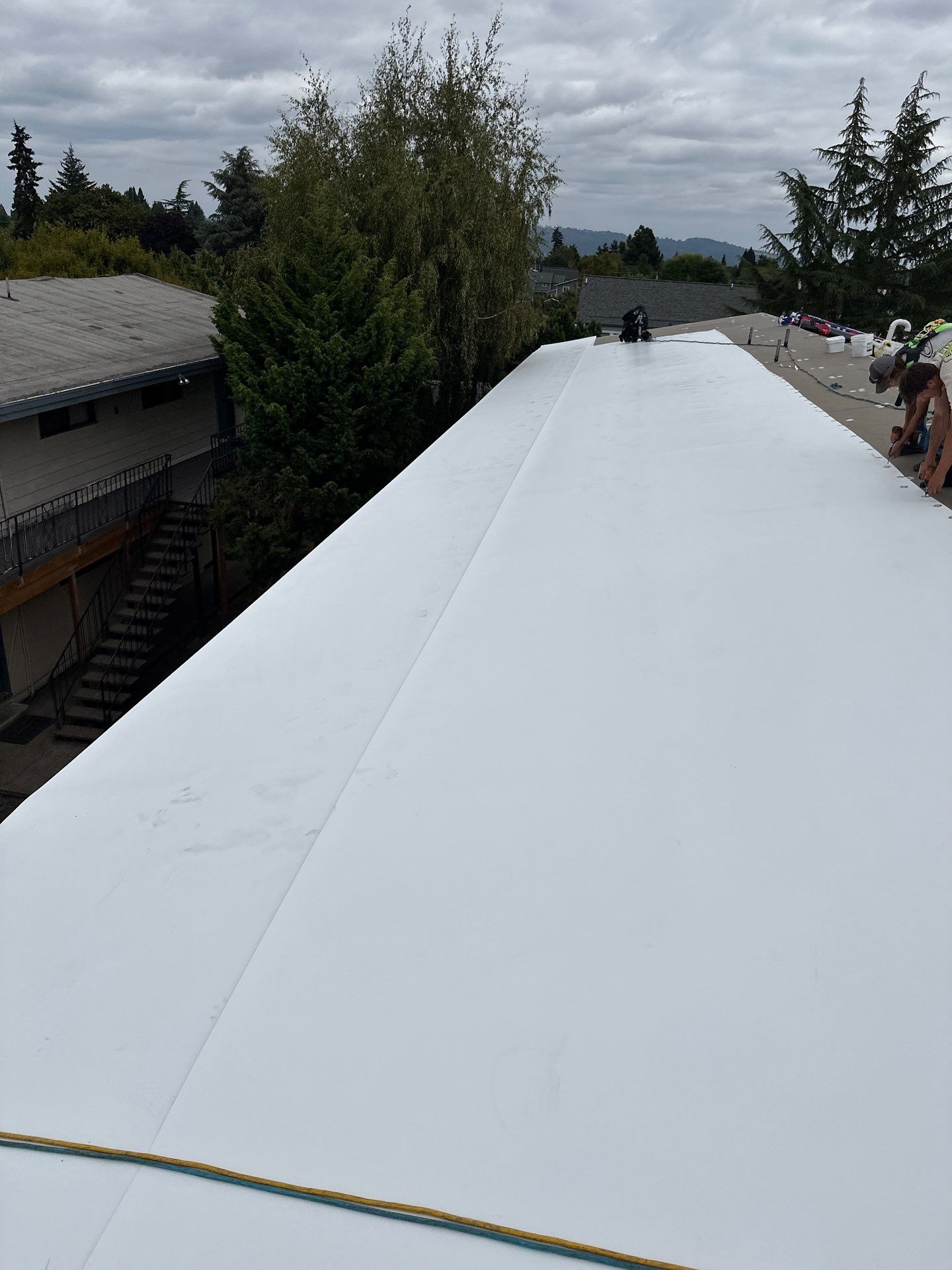 Commercial Flat Roof Installation using GAF 60Mil TPO  by Orezona Building & Roofing Company, Inc.