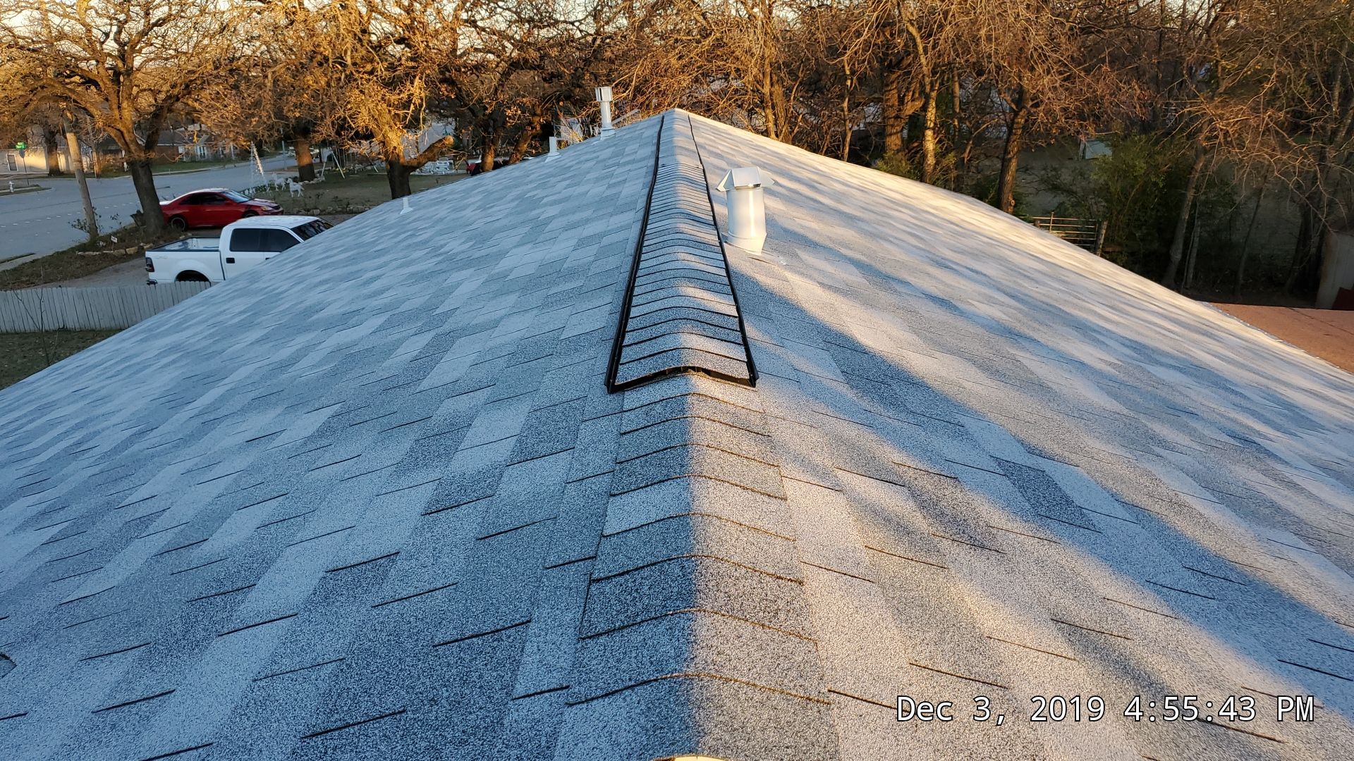 Residential Roofing Installation using Roofing Shingles by Harvey Roofing & Construction