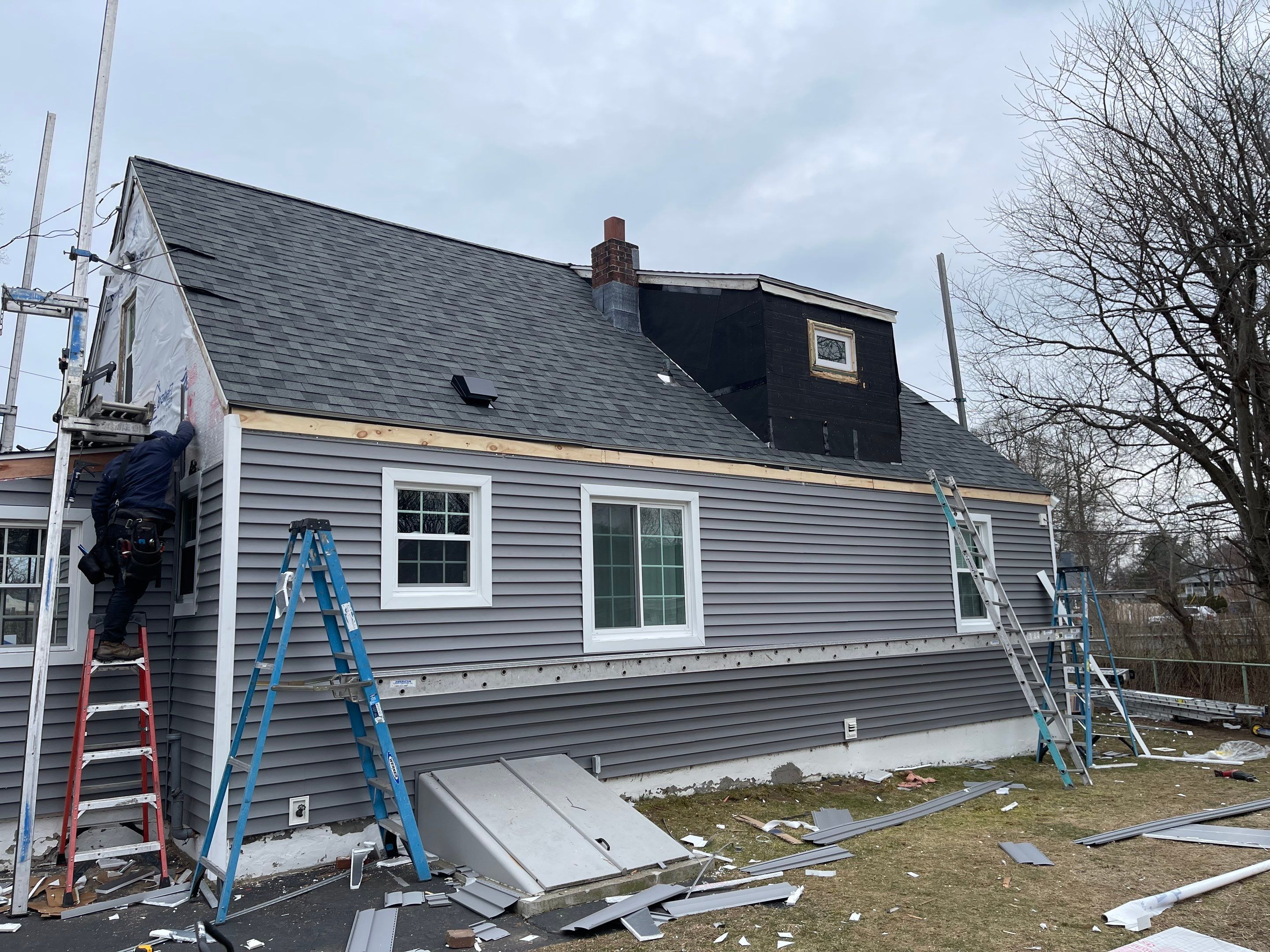 Transform your Home's Exterior with Our Roofing, Siding, Windows, and Carpentry services by A Plus Exterior