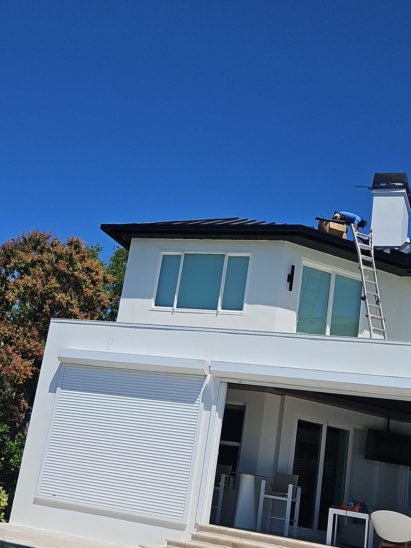 Soffit and Fascia Installation and black seamless gutters in Sarasota FL by Gutter Professors
