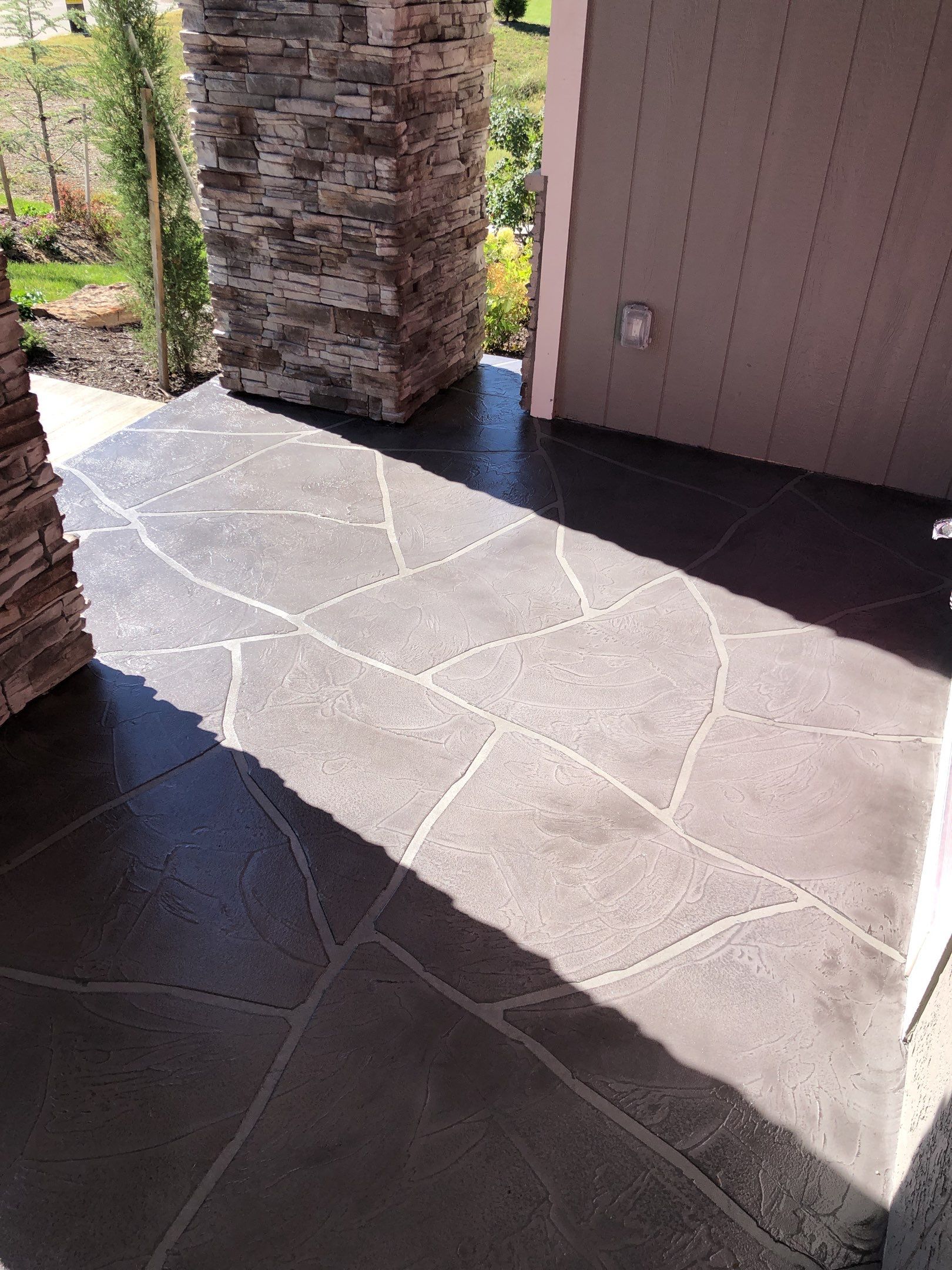 Overland Park -- Front Porch with Tuscan Flagstone Overlay by Big Red Decorative Concrete, LLC