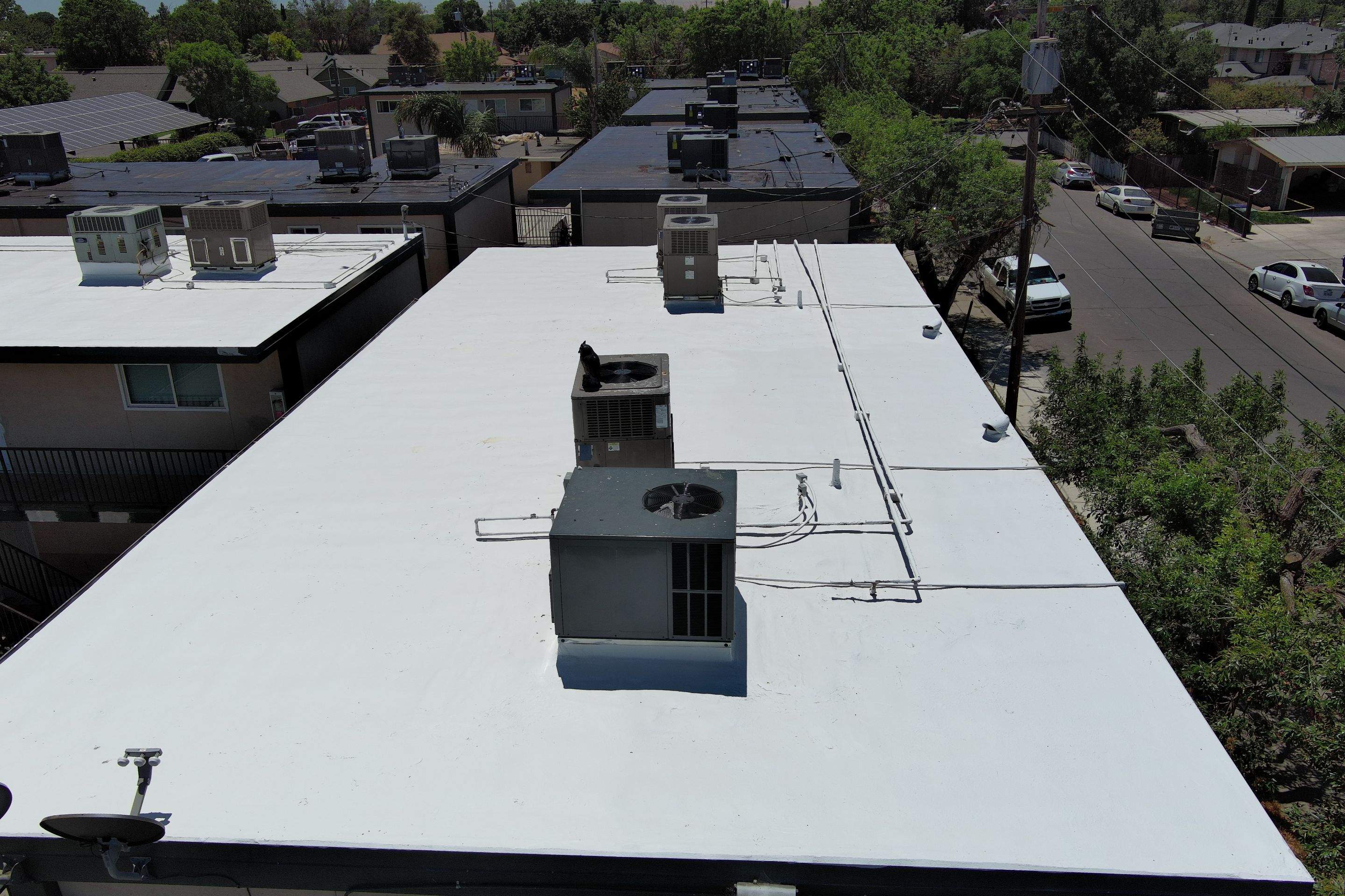 Foam Refurbish using General Coatings acrylic coatings and spray foam by Straight Edge Roofing Inc