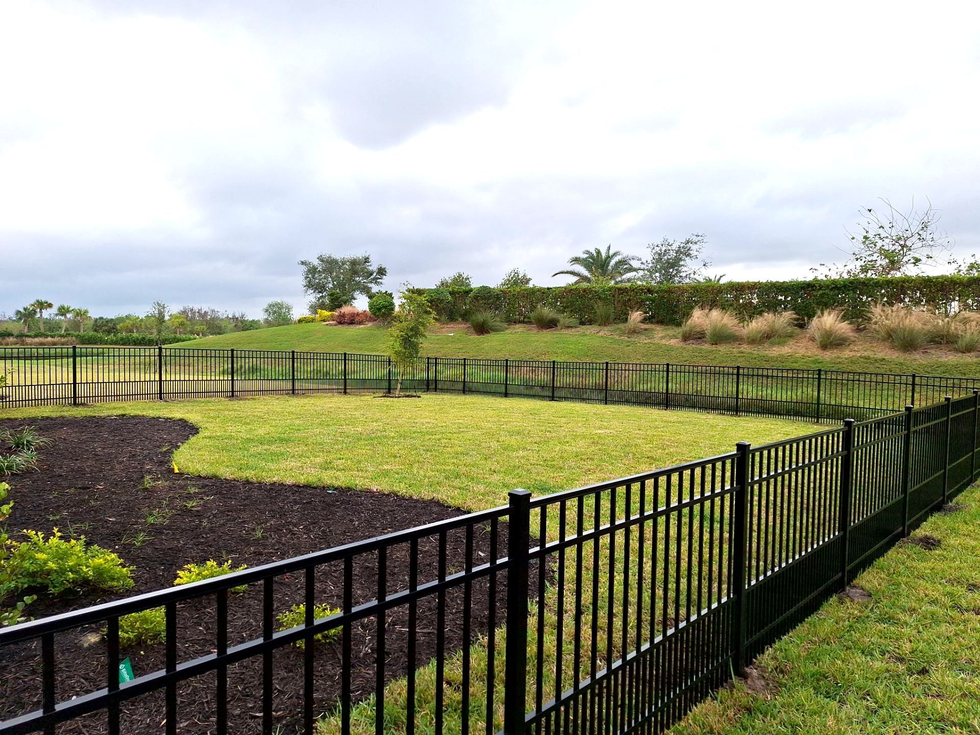 Aluminum Fence Installation using 4ft 3 Rail Black Aluminum Fence by Asap fence and gates, LLC