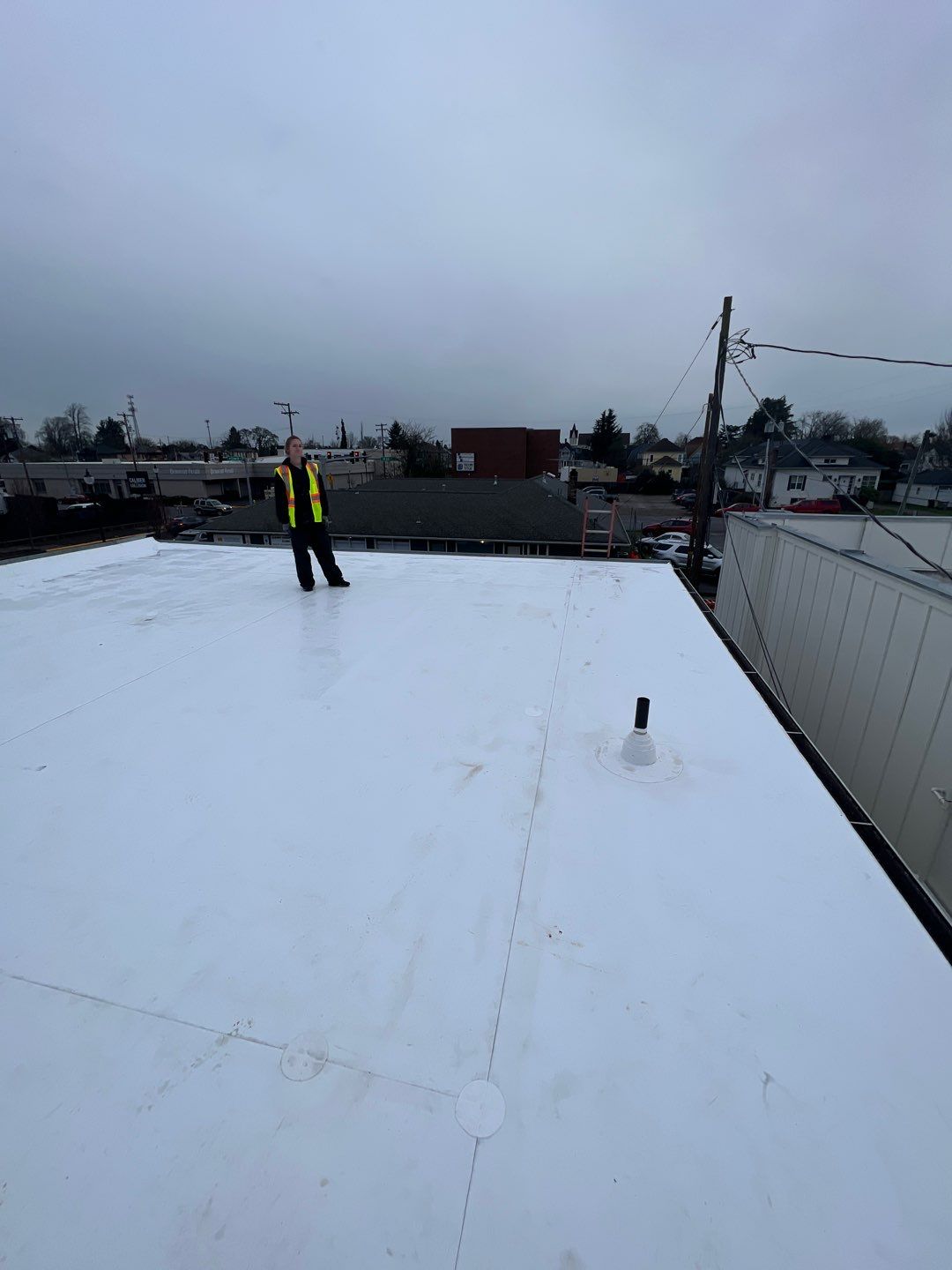 Commercial Flat Roof Installation using GAF 60Mil TPO  by Orezona Building & Roofing Company, Inc.