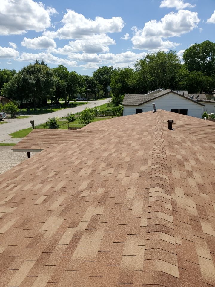 Residential Roofing Installation using Roofing Shingles by Harvey Roofing & Construction
