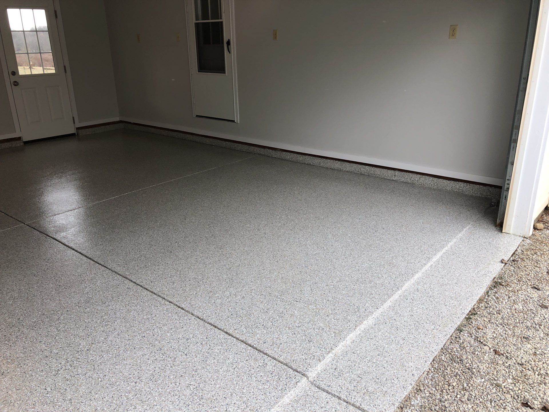 Garages using Mt. Everest  by Fantastic Floors by Miller Custom Exteriors 