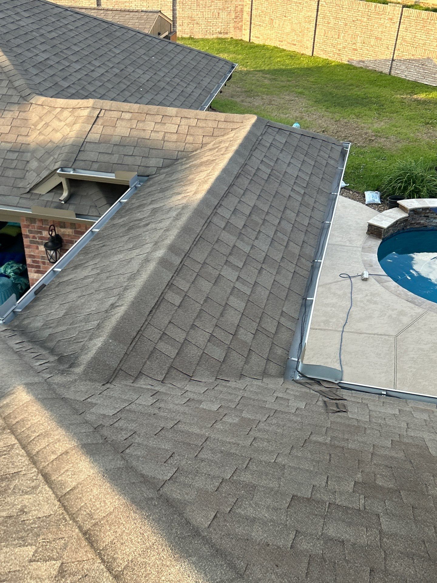 Hail Damage using Owen's Corning Duration (Lifetime) Shingles by Roof Repair Company