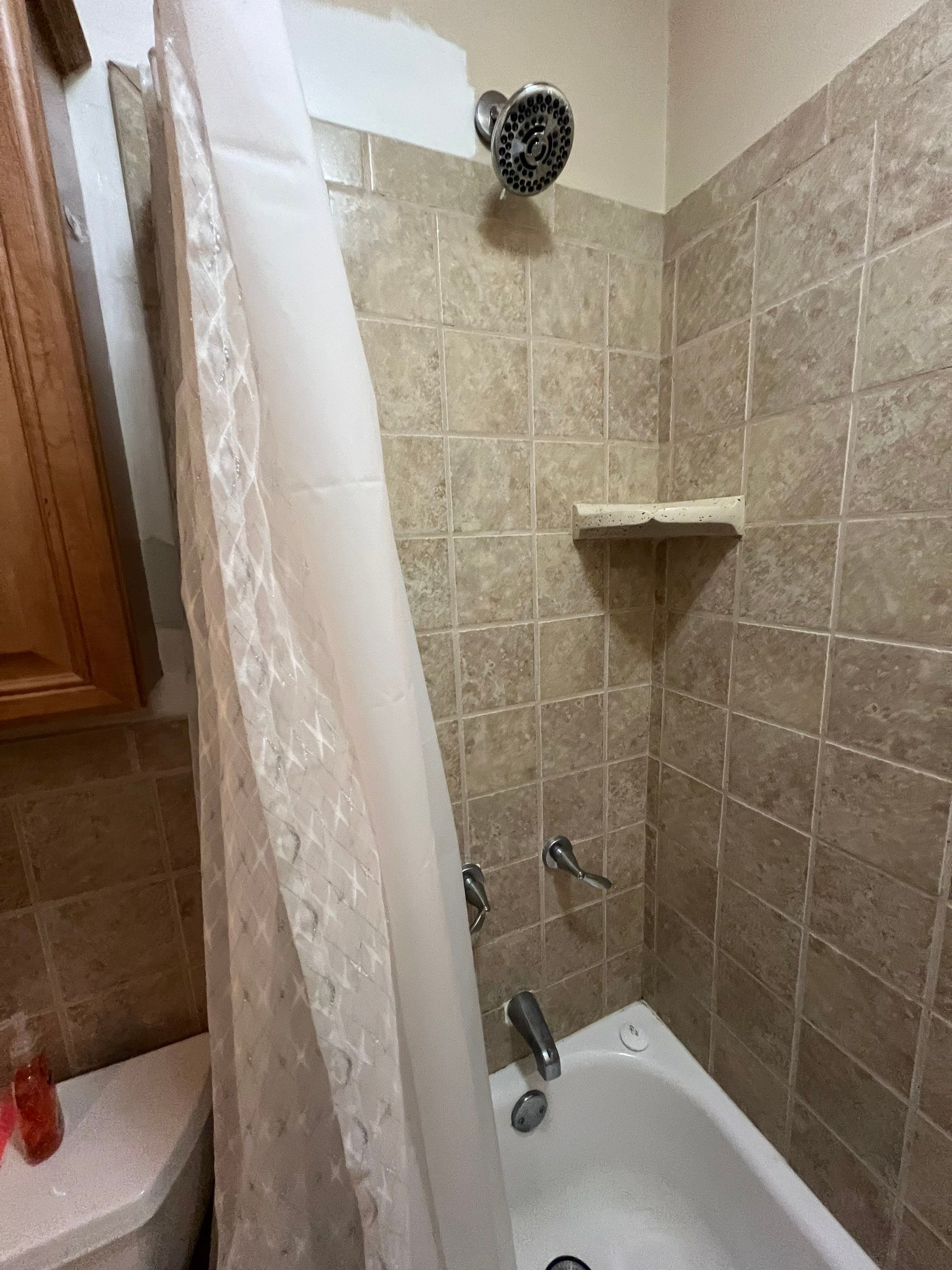 Tub to Shower Conversion using BCI Acrylic Shower System by Secure Construction Company Inc
