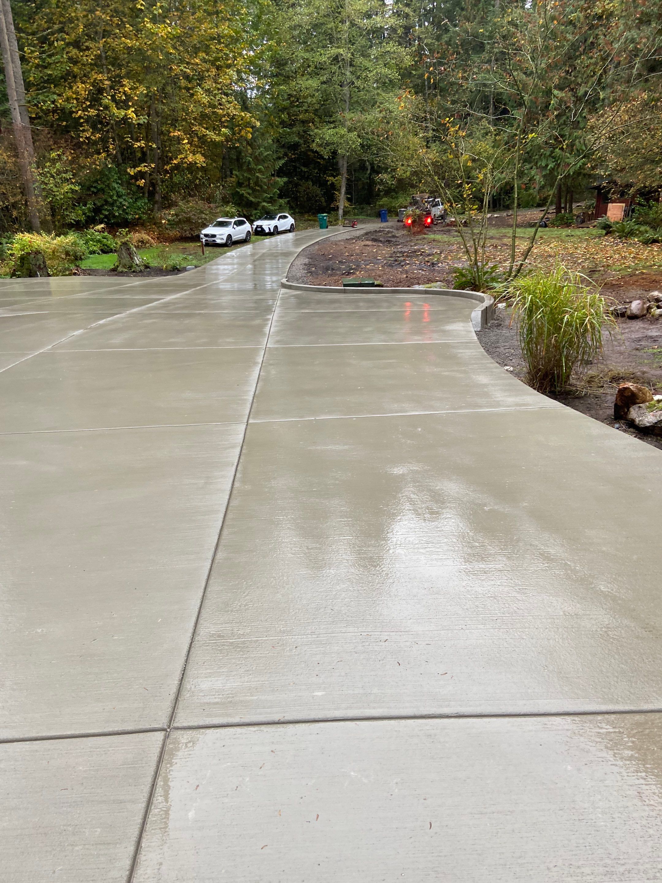Pia | Custom Concrete Driveway, Walkway & Floating Steps by Jireh Asphalt & Concrete Inc 