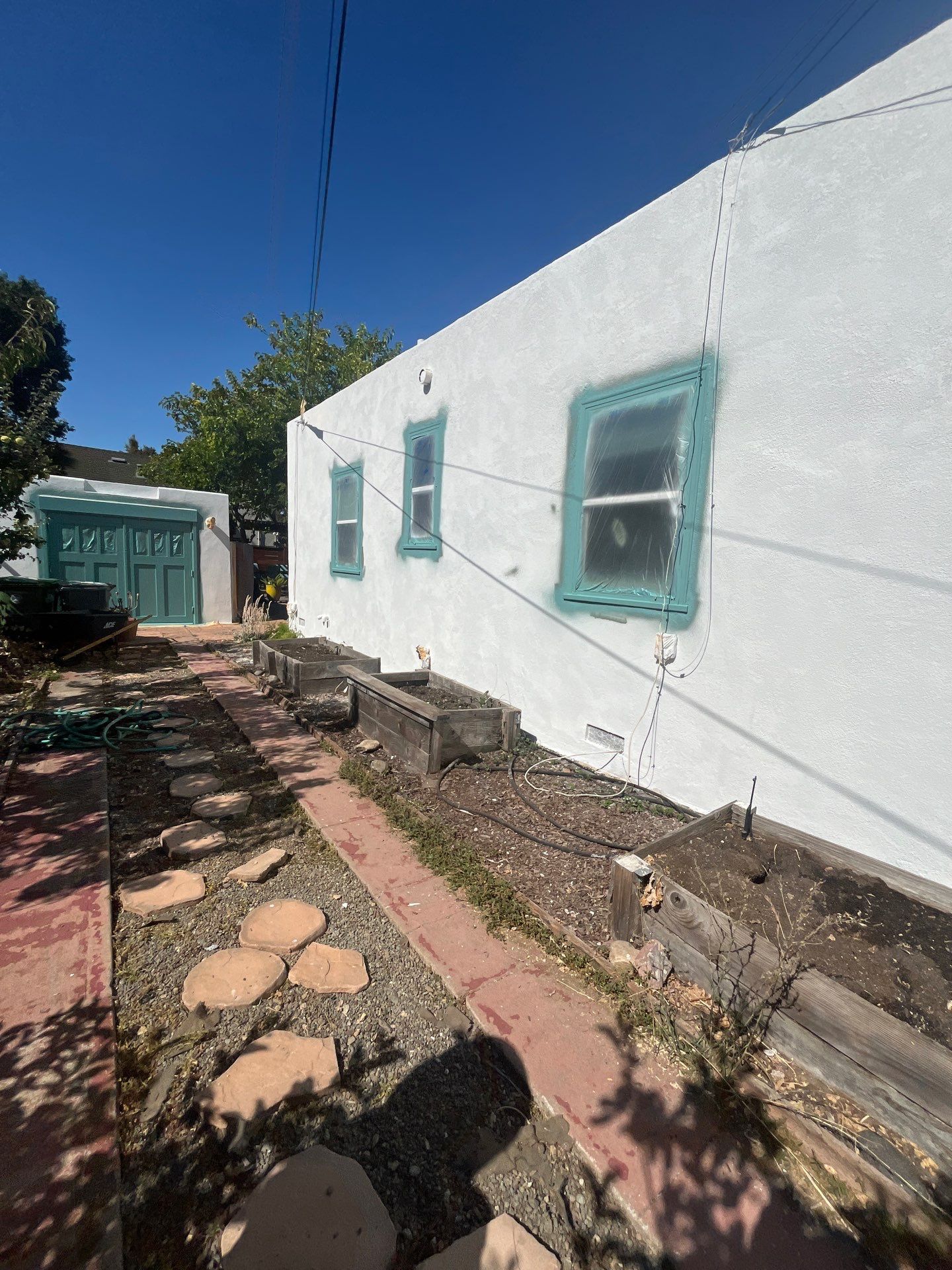 Exterior Transformation with Fresh Stucco and elastomeric system for waterproofing by Herrera’s Bay Area Painting inc.