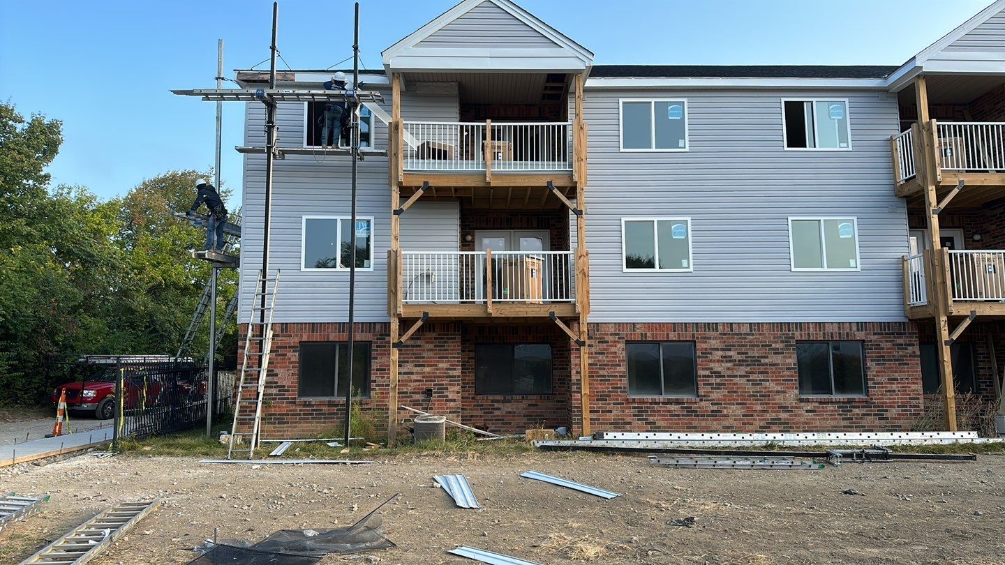 Roofing, windows, doors, siding by Tamlin Roofing