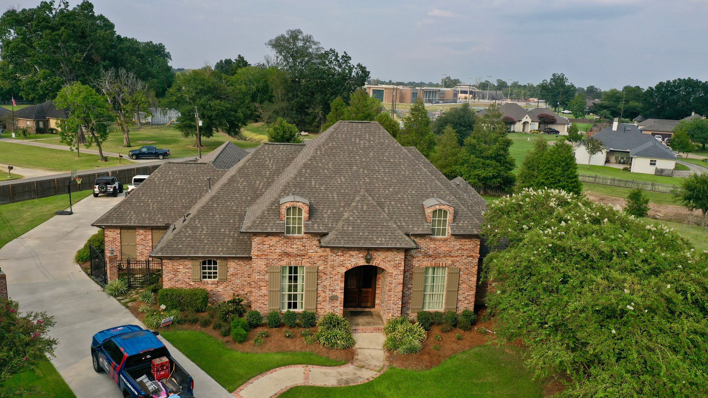 Residential Roofing Installation using Atlas Pinnacle Impact Weathered Wood; Weathered Bronze Gutters  by Top Team Construction
