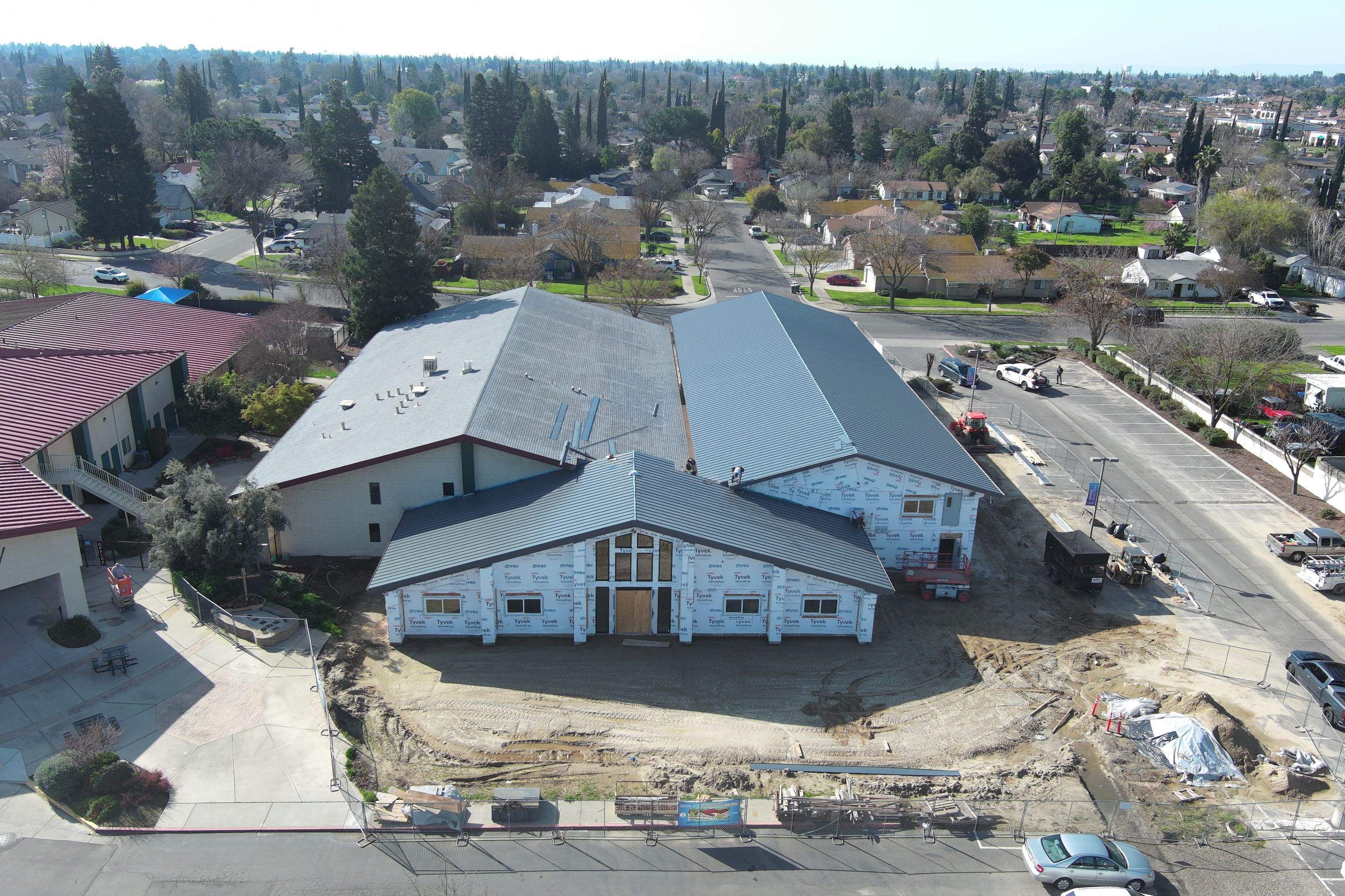 Metal roofing installation on church by Straight Edge Roofing Inc