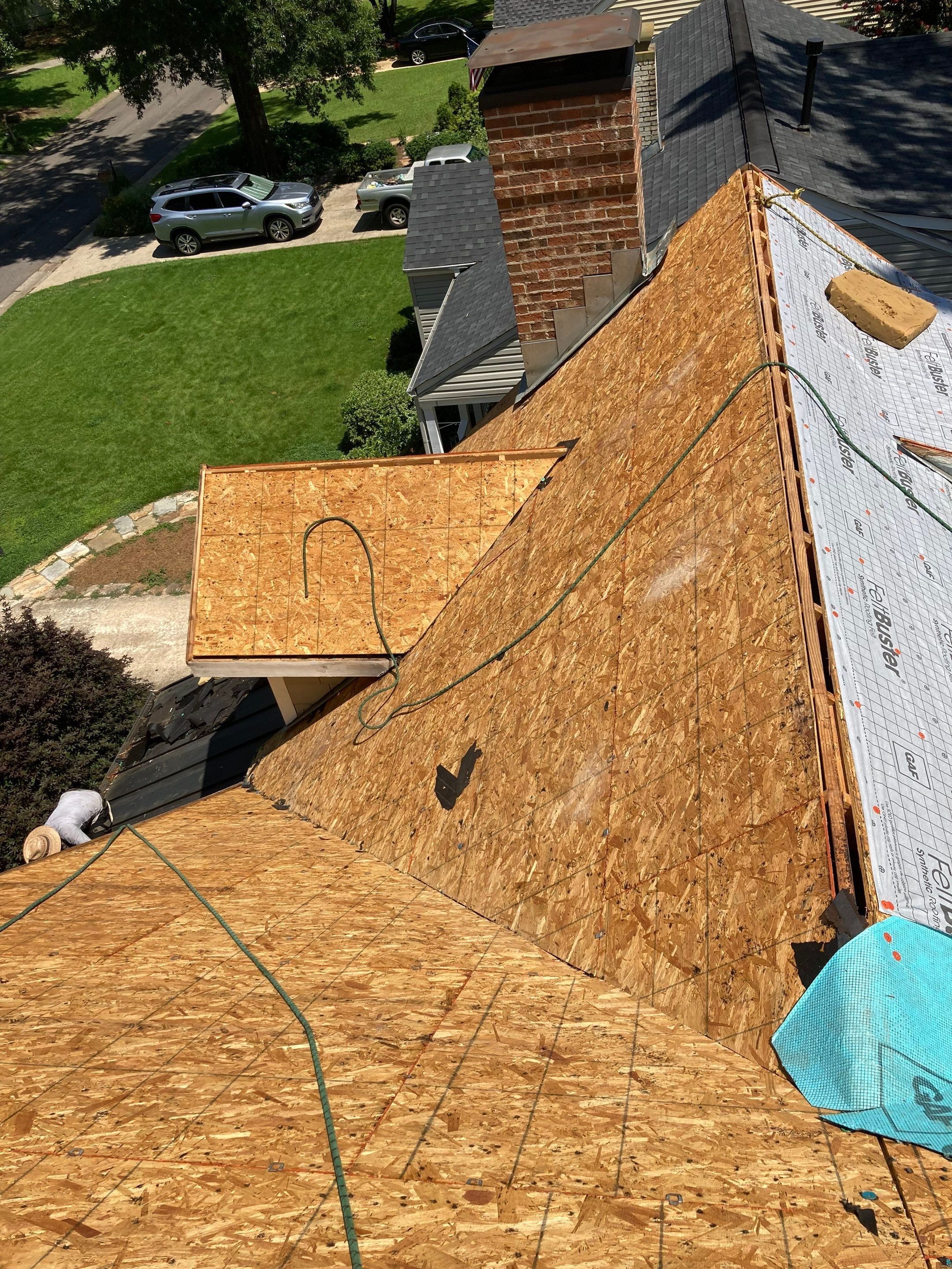 Residential Roofing Installation using Architectural Shingles by The Roofing Dudes