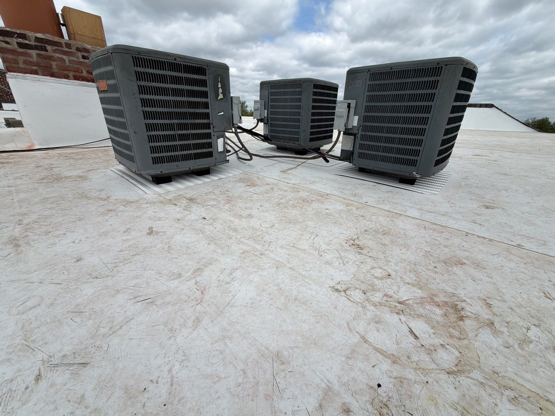 Multi-Family TPO Roof Installation and Masonry Repair in St. Louis by Acute Roofing And Exteriors