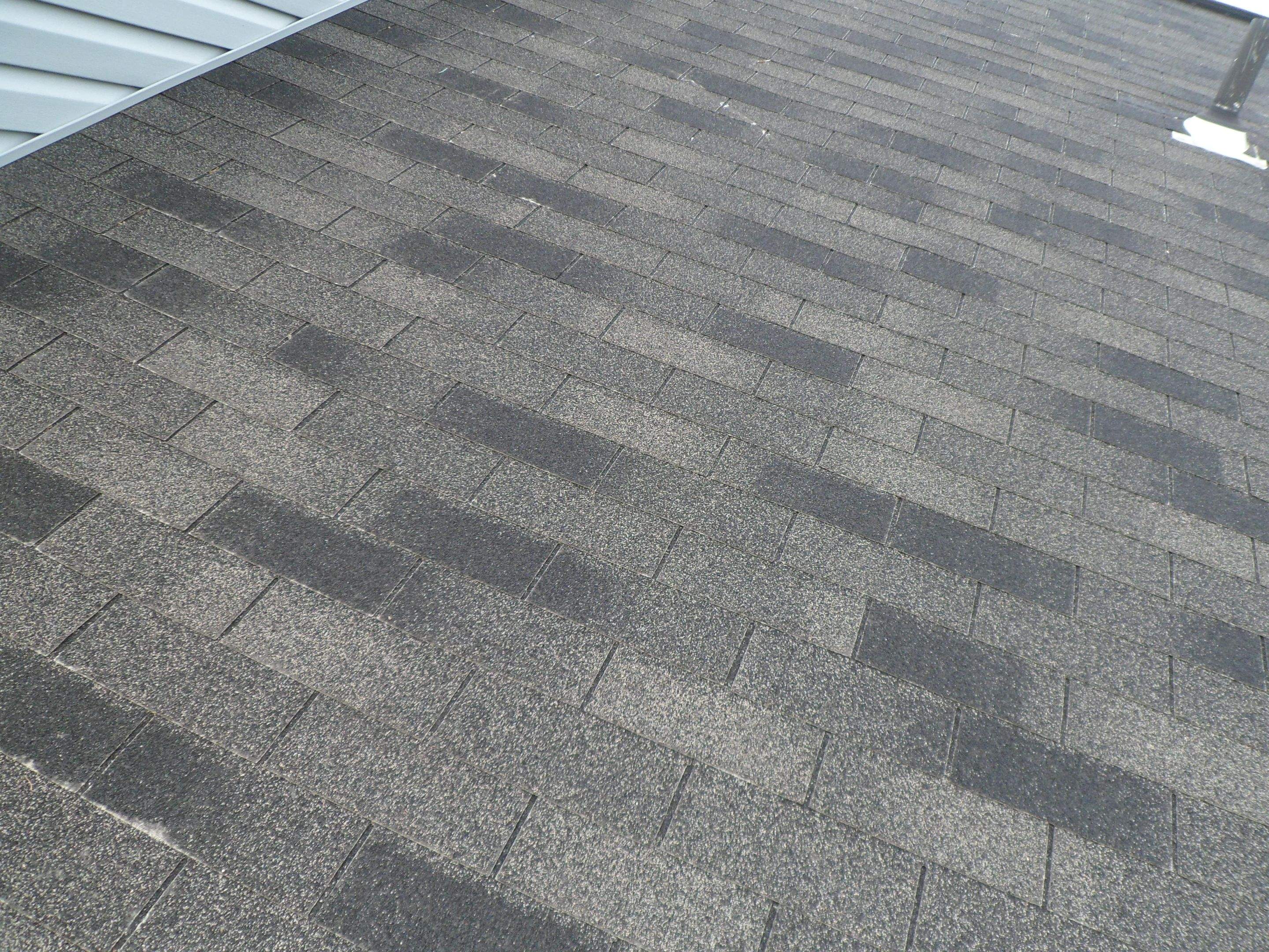 Residential Roofing Installation using XT-25 Color Moire Black by Alpha Design Services