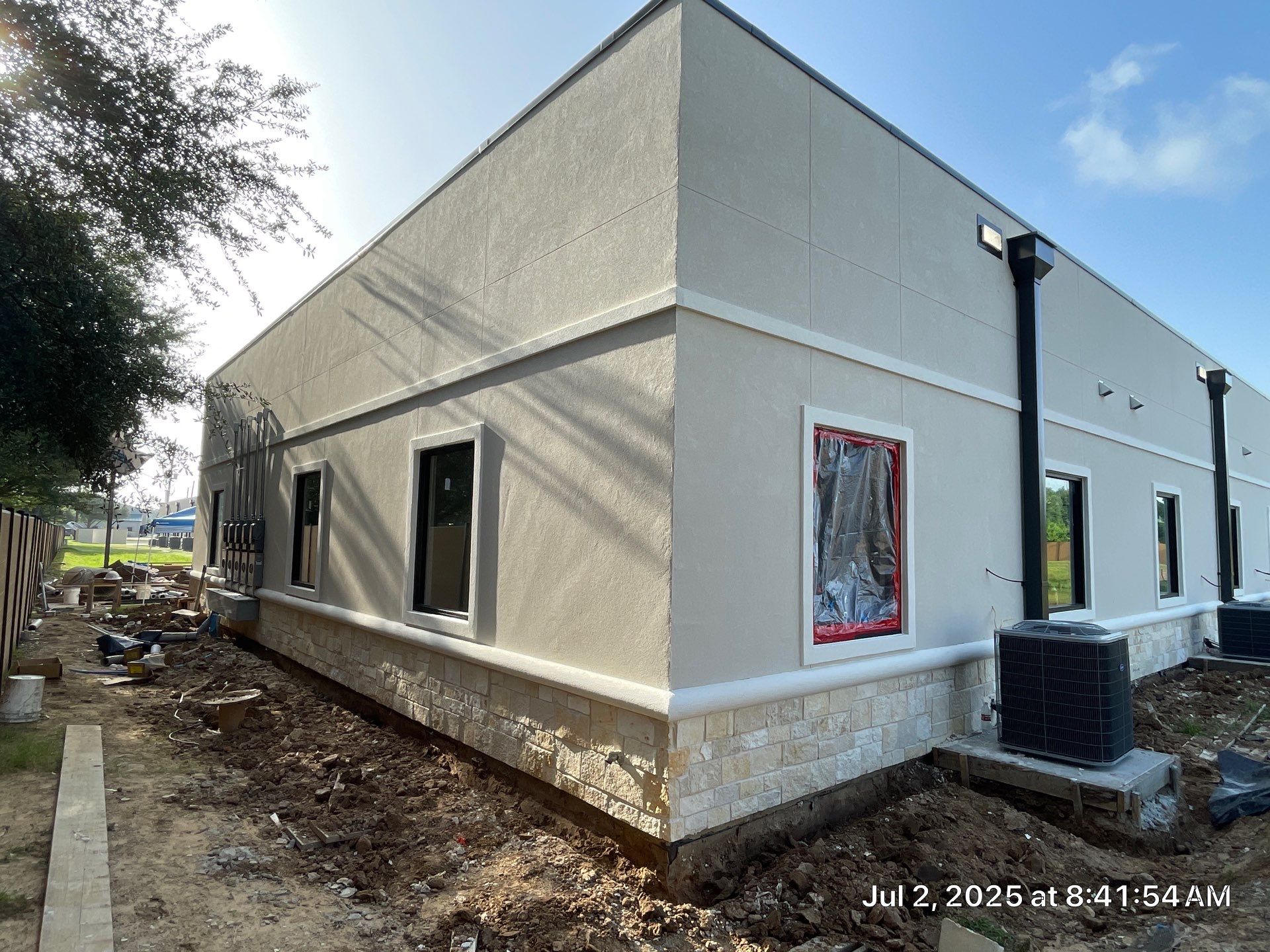 Commercial Façade Excellence with Bullnose Detailing by Apex Conventional Stucco Llc