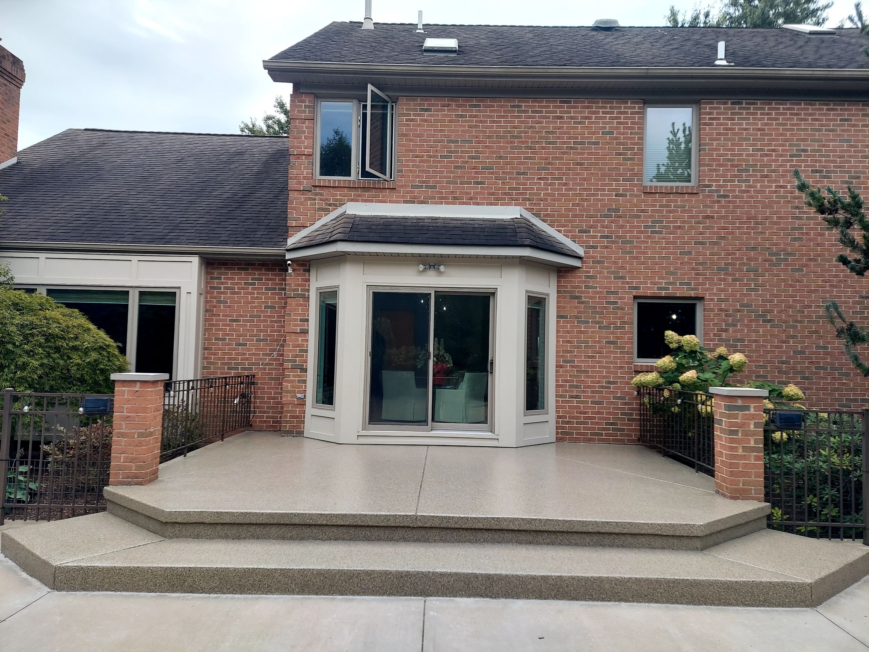 Patio in Trail Mix - Hermitage, PA by Alexander Concrete Coatings