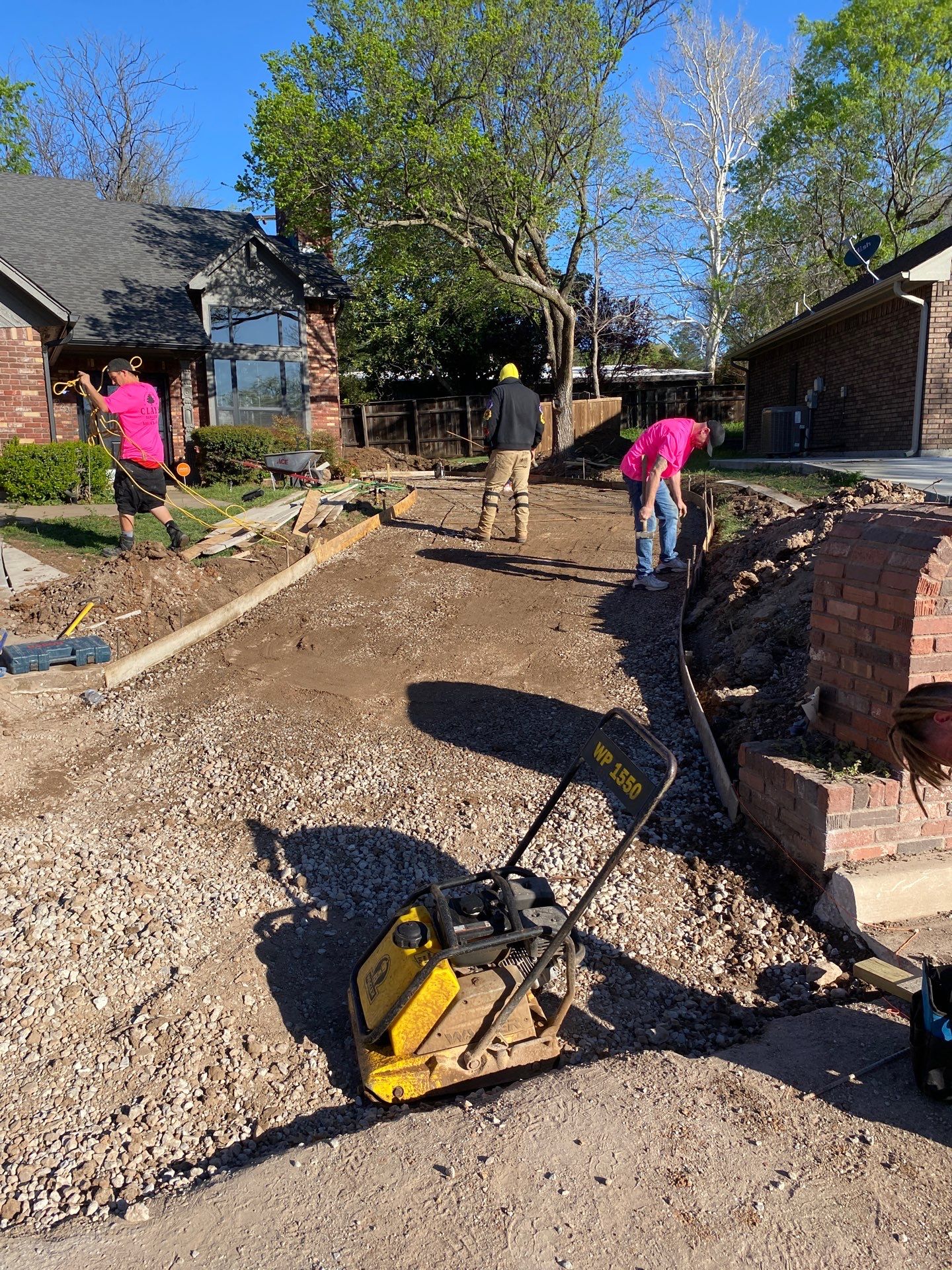 Concrete Driveway and Fence by Clays Services Inc