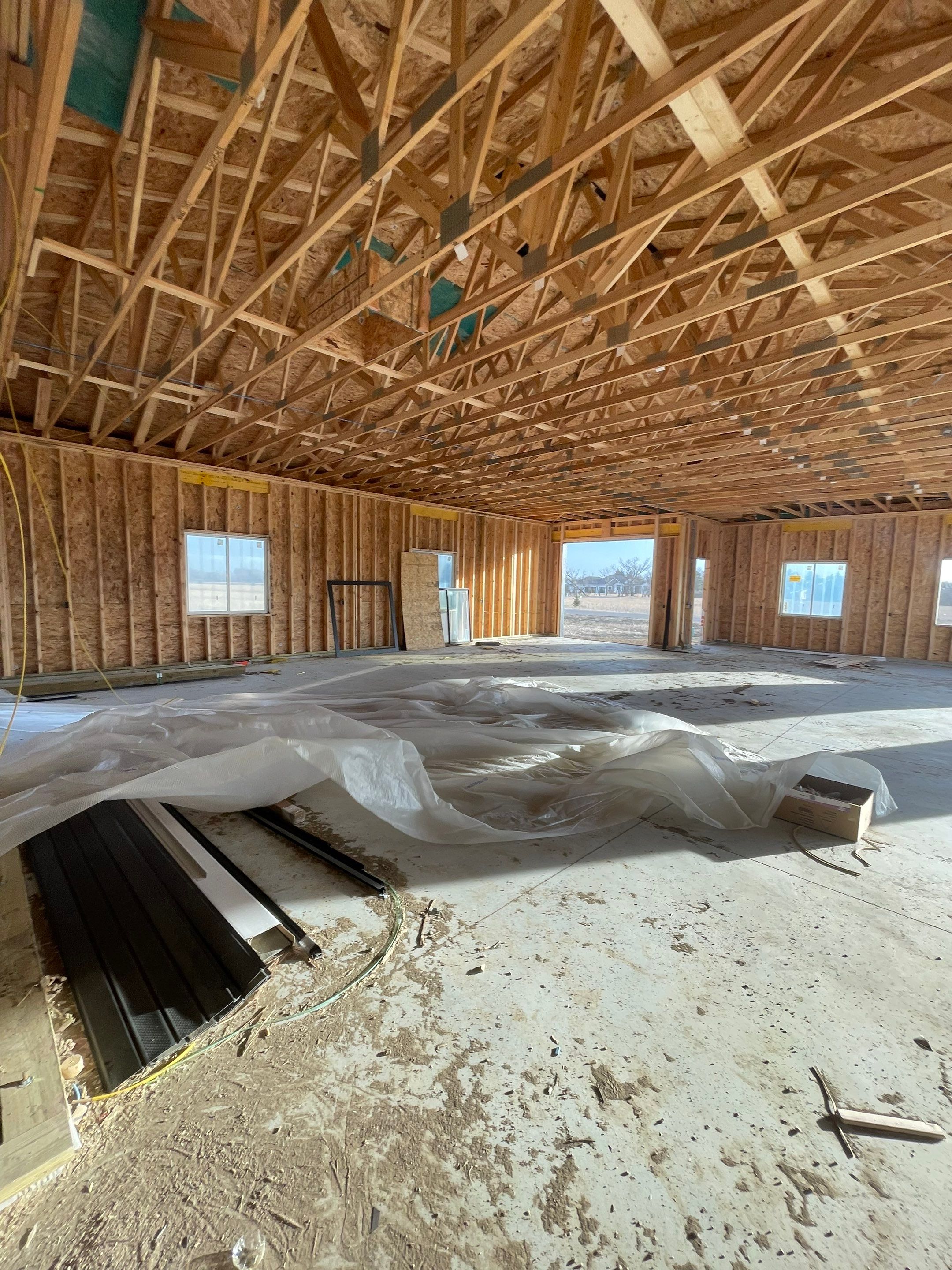 Multi-Bay Garage Concrete Coating and Floor Refinishing in South Dakota by Select Painting, Coatings & Garage Cabinets
