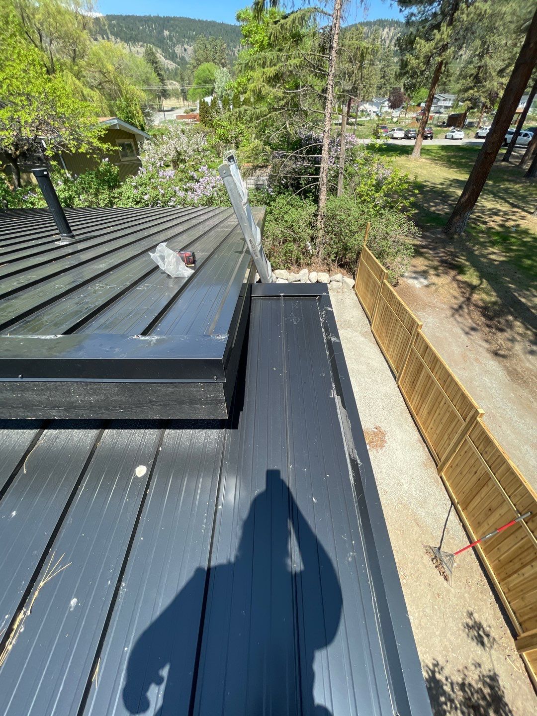 Residential Roofing Installation using 12" Prolok metal  by Top Notch Roofing Inc