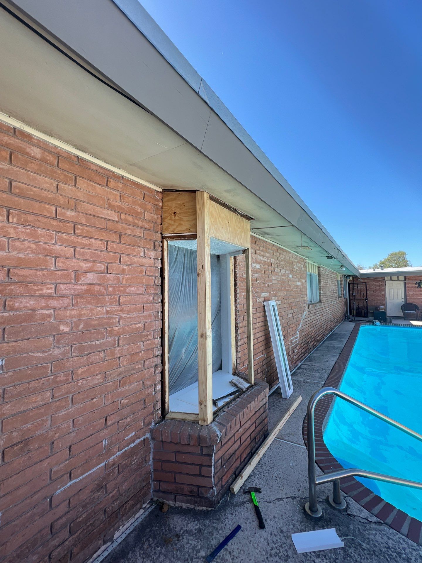Windows in Brick with a Bay Window by Bayfront Roofing and Construction