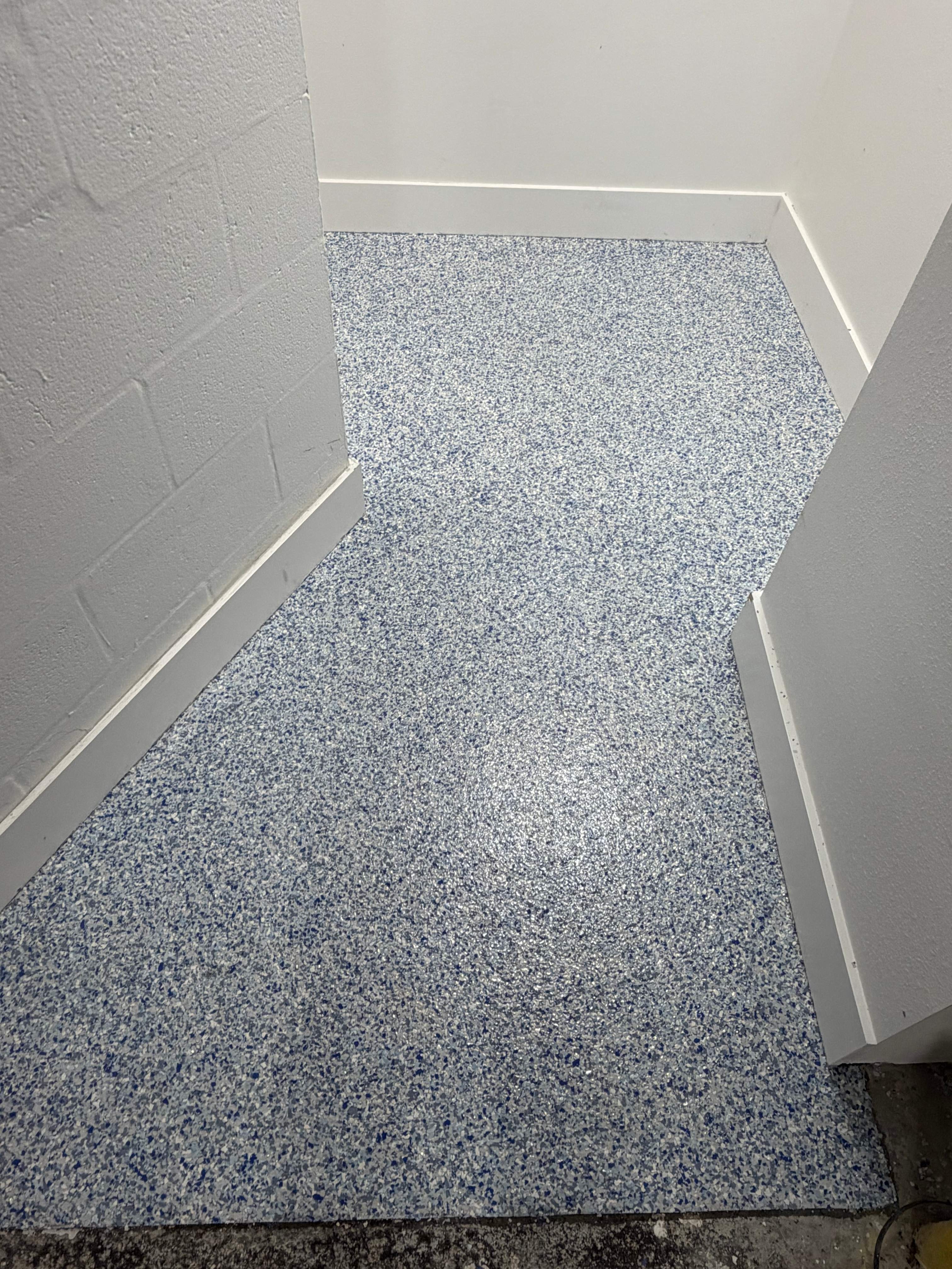 Commercial Restroom Renovation with Epoxy Flooring in Sarasota by Vertical General Contracting 