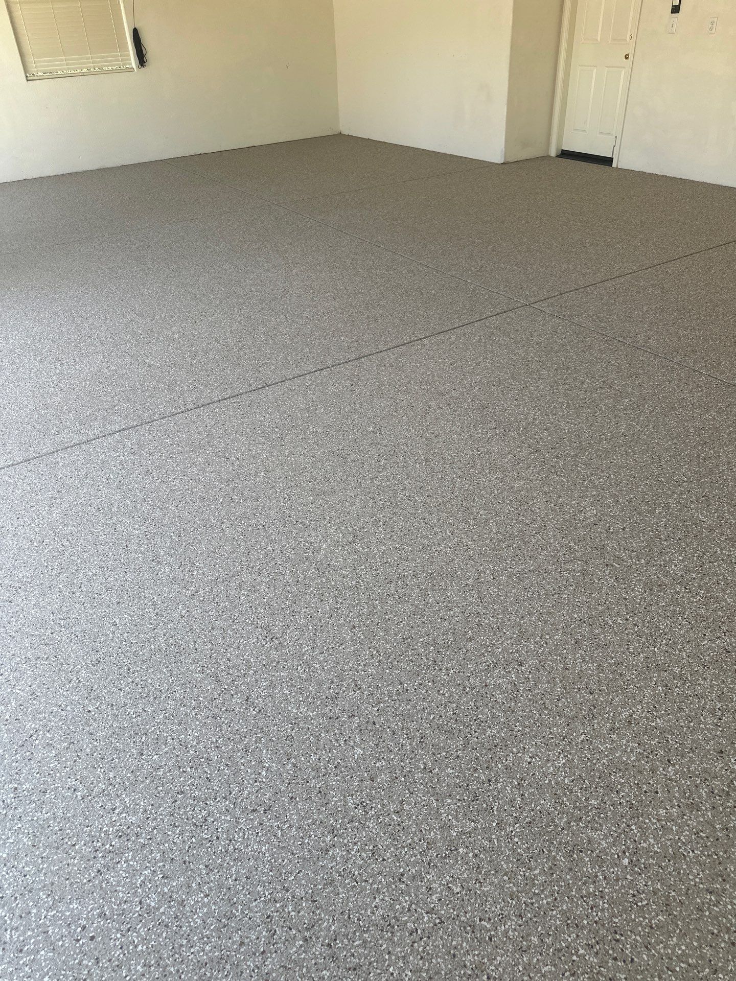Polyurea Garage Floor Coating with Creekbed Finish in Arroyo Grande by MGP Coatings