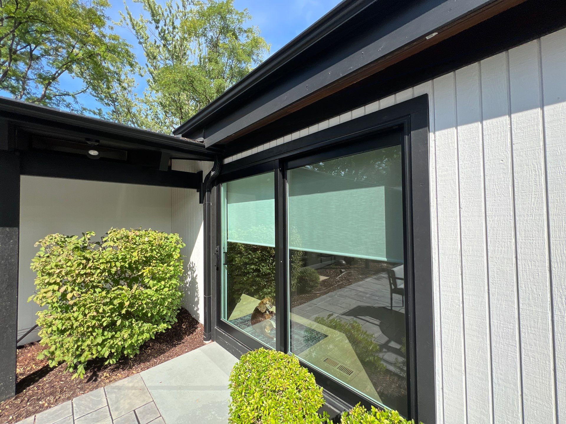 Complete Exterior House, Bluestone & Garage Floor Cleaning by Northern Power Washing LLC.