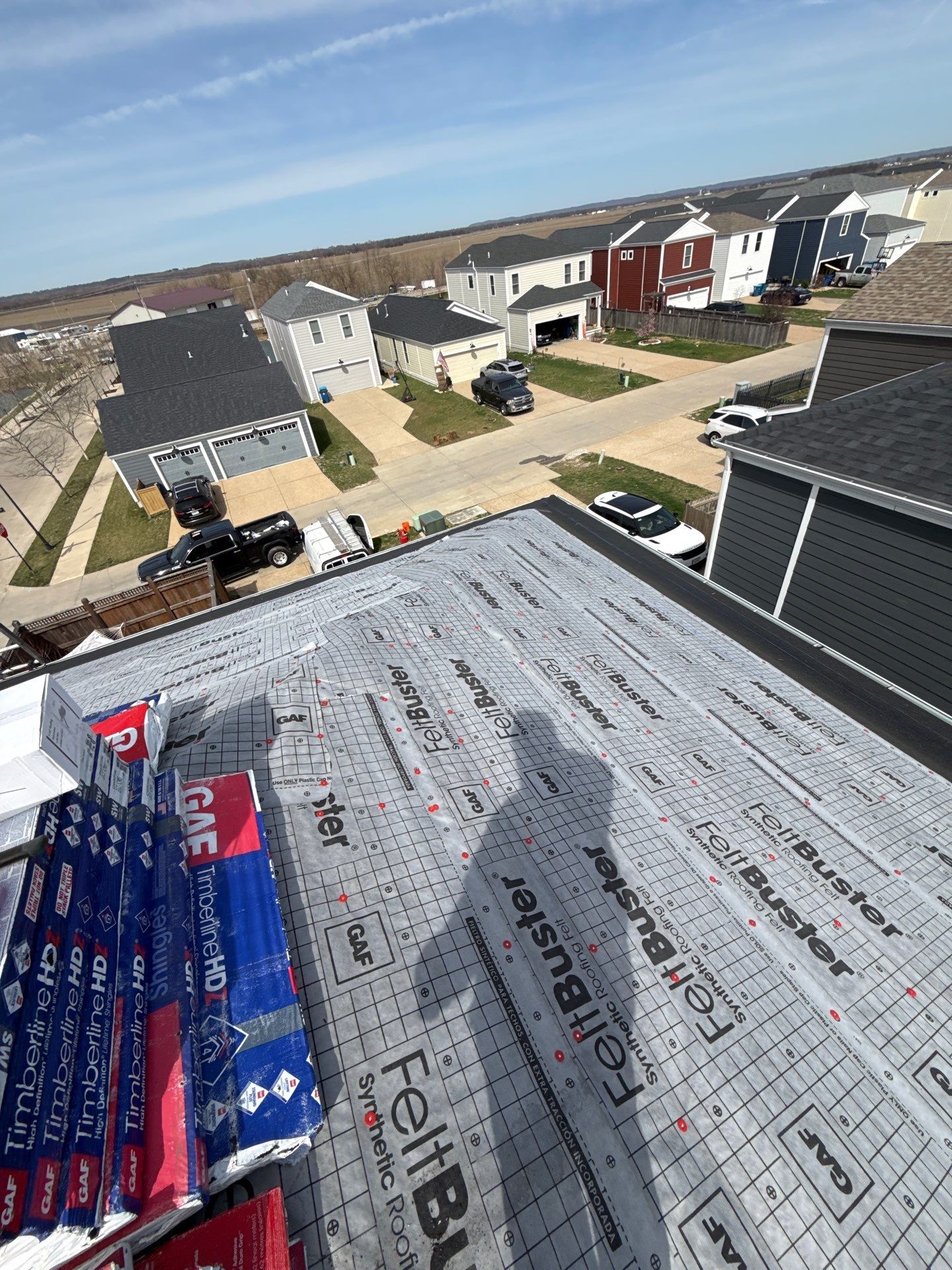 Complete Roof and Siding Replacement for Hail Damage in New Town, St. Charles by Acute Roofing And Exteriors 