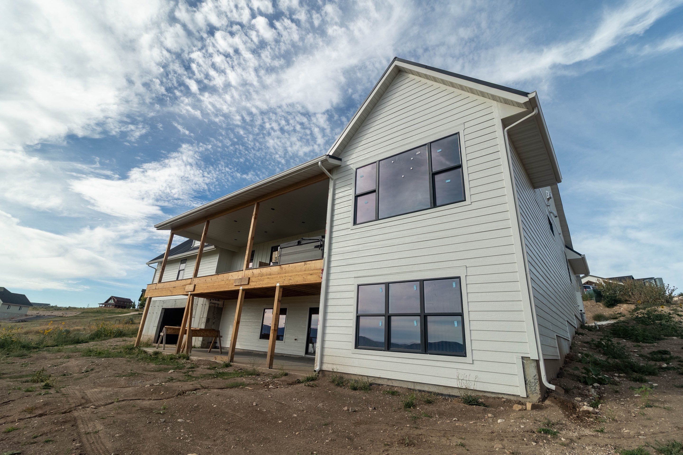 LP SmartSide Siding and Metal Roofing Installation in Garden City by Garner Construction