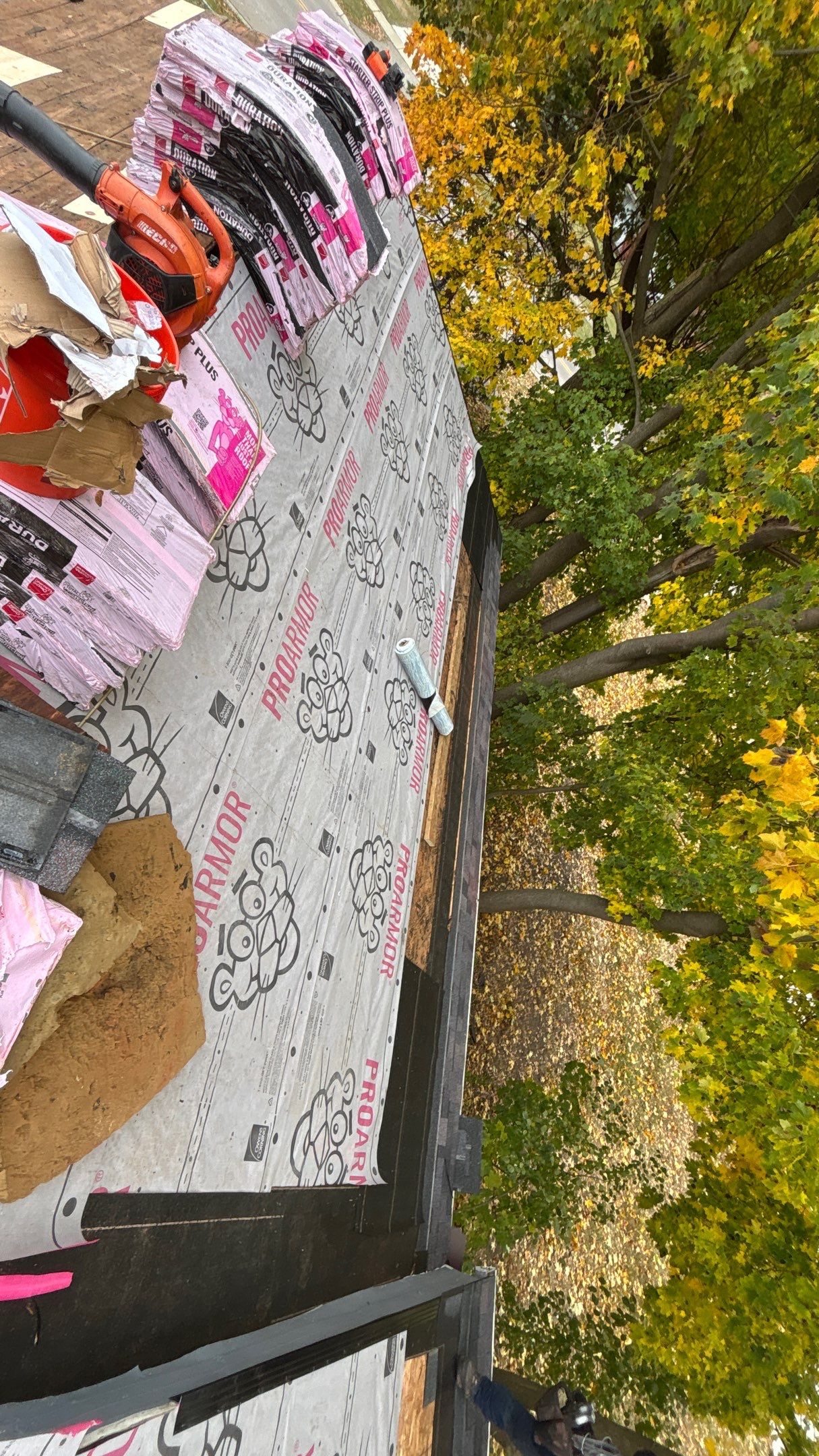 Roof Replacement using Owens Corning Midnight Plum by 180 Contractors