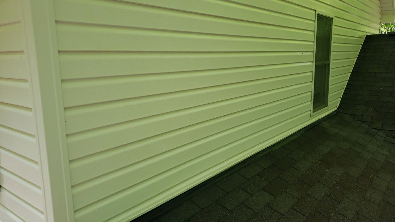 House Wash using cleaner by Power Wash Masters LLC