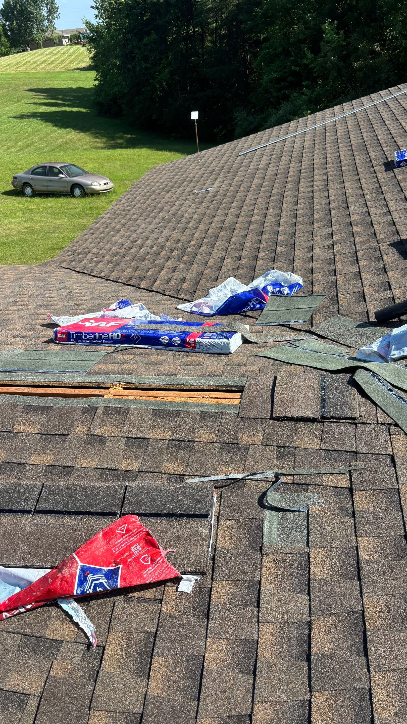 Residential Roofing Installation using GAF Timberline HDZ Barkwood by Rainstoppers Roofing