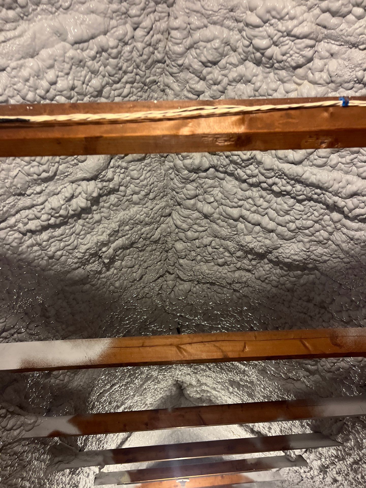 Attic Retrofit using open cell spray foam by NYS Foam & Energy