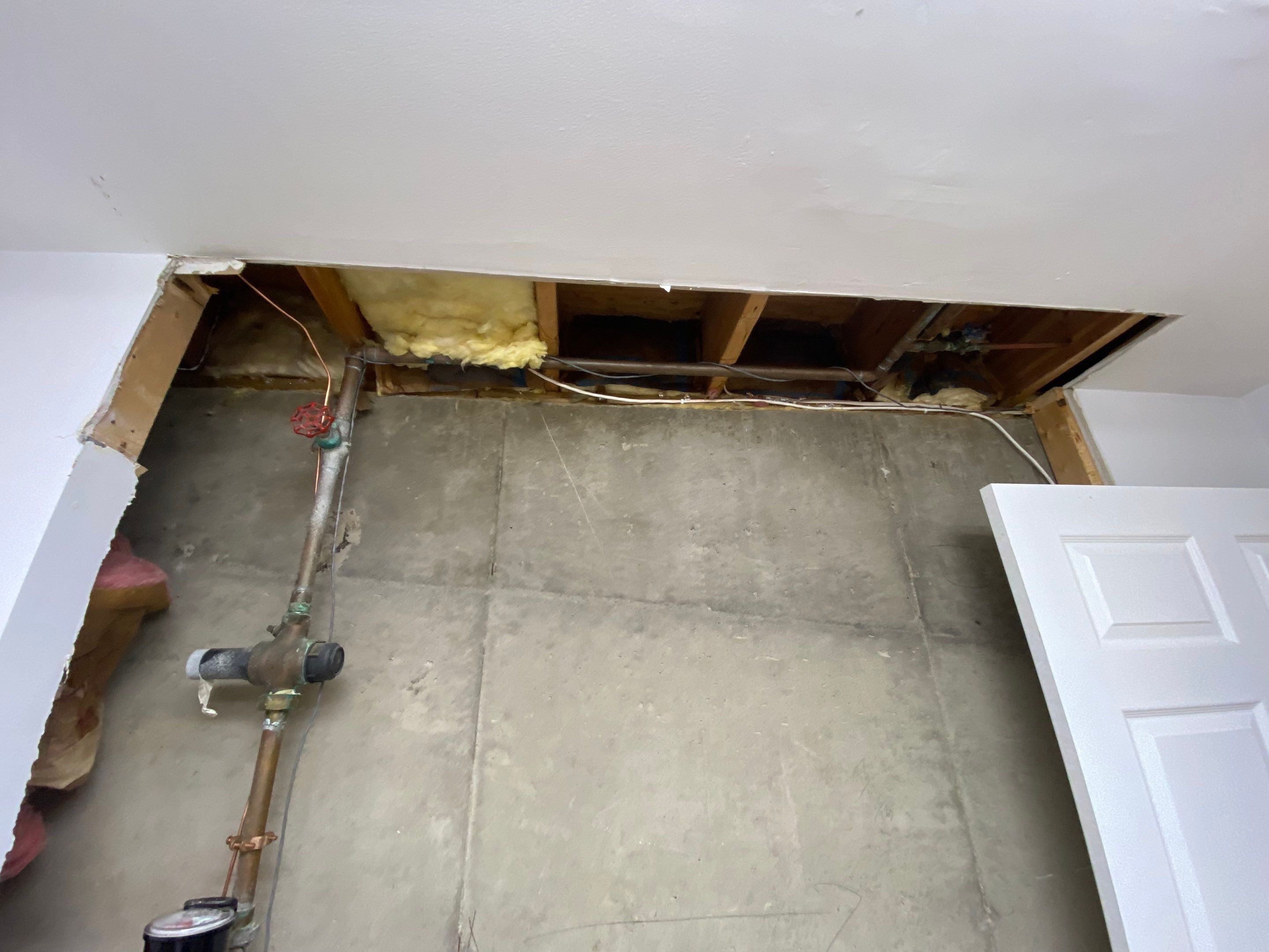 Laundry Room Redmodel using Lifeproof Luxury Vinyl Plank Flooring by The Smet Companies, LLC