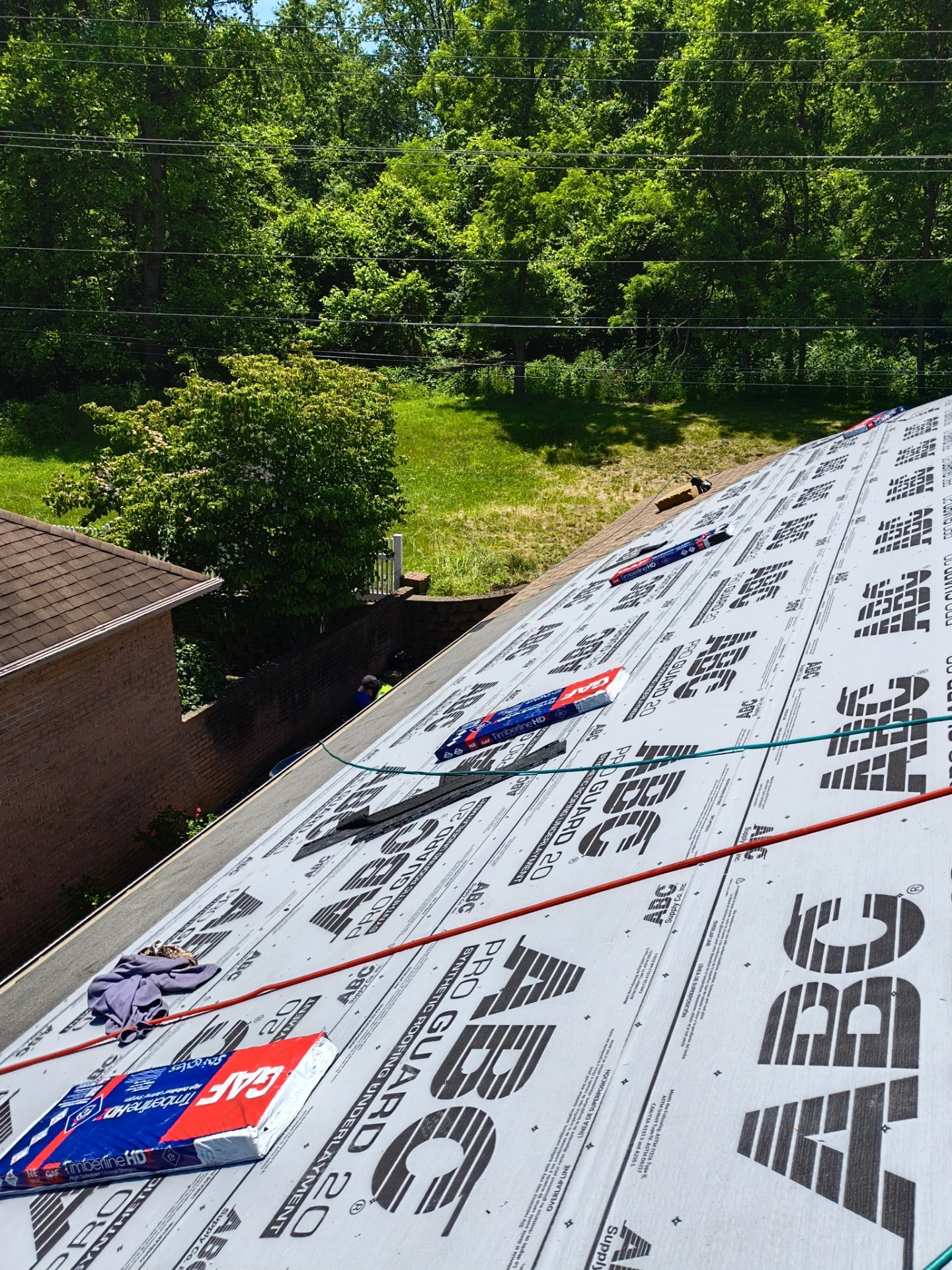 Residential Roofing Installation using GAF Timberline HDZ Shakewood by Rainstoppers Roofing