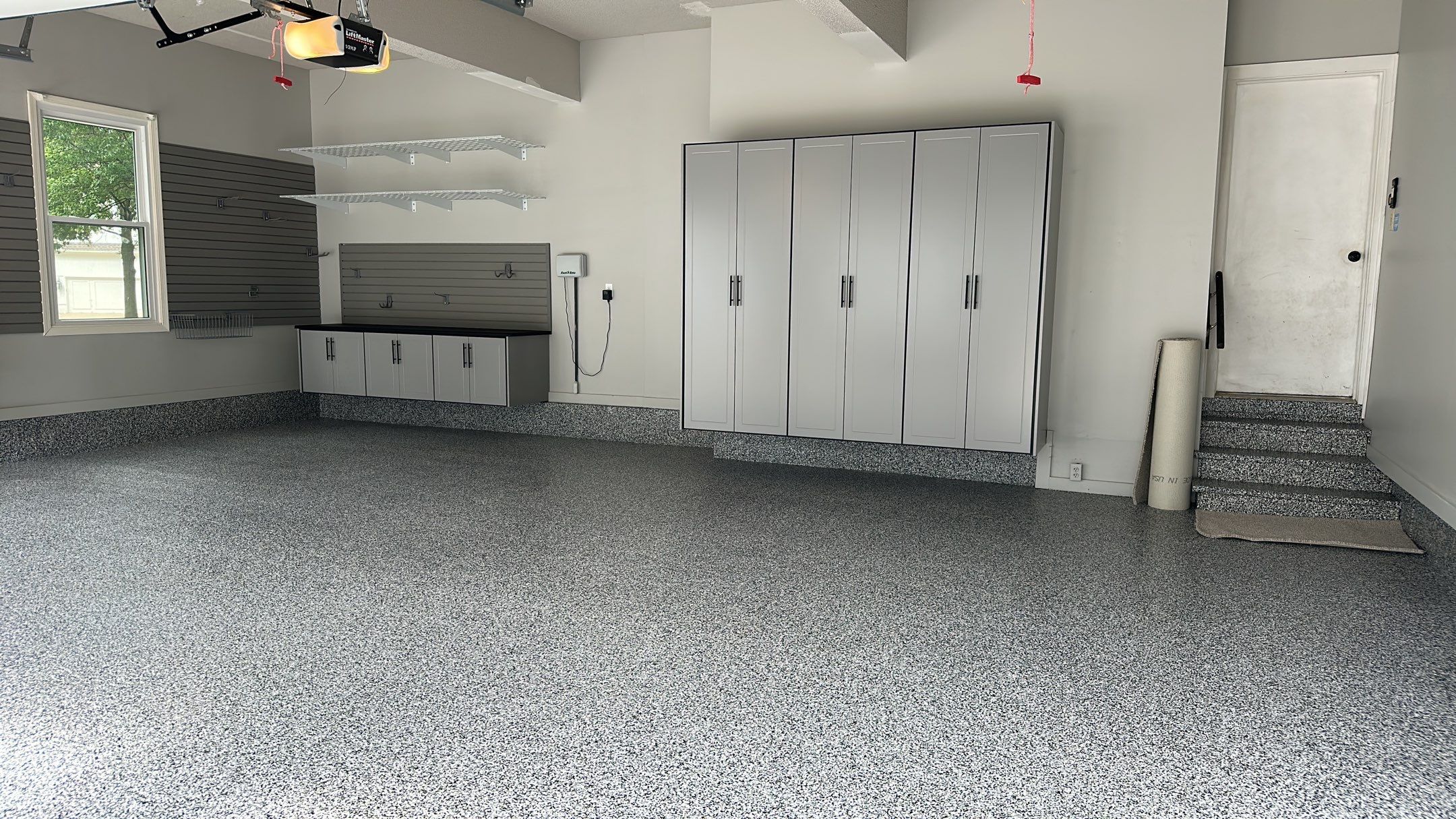 Julie H. upgraded her garage with our cabinets and wall storage options  by Banner Garage