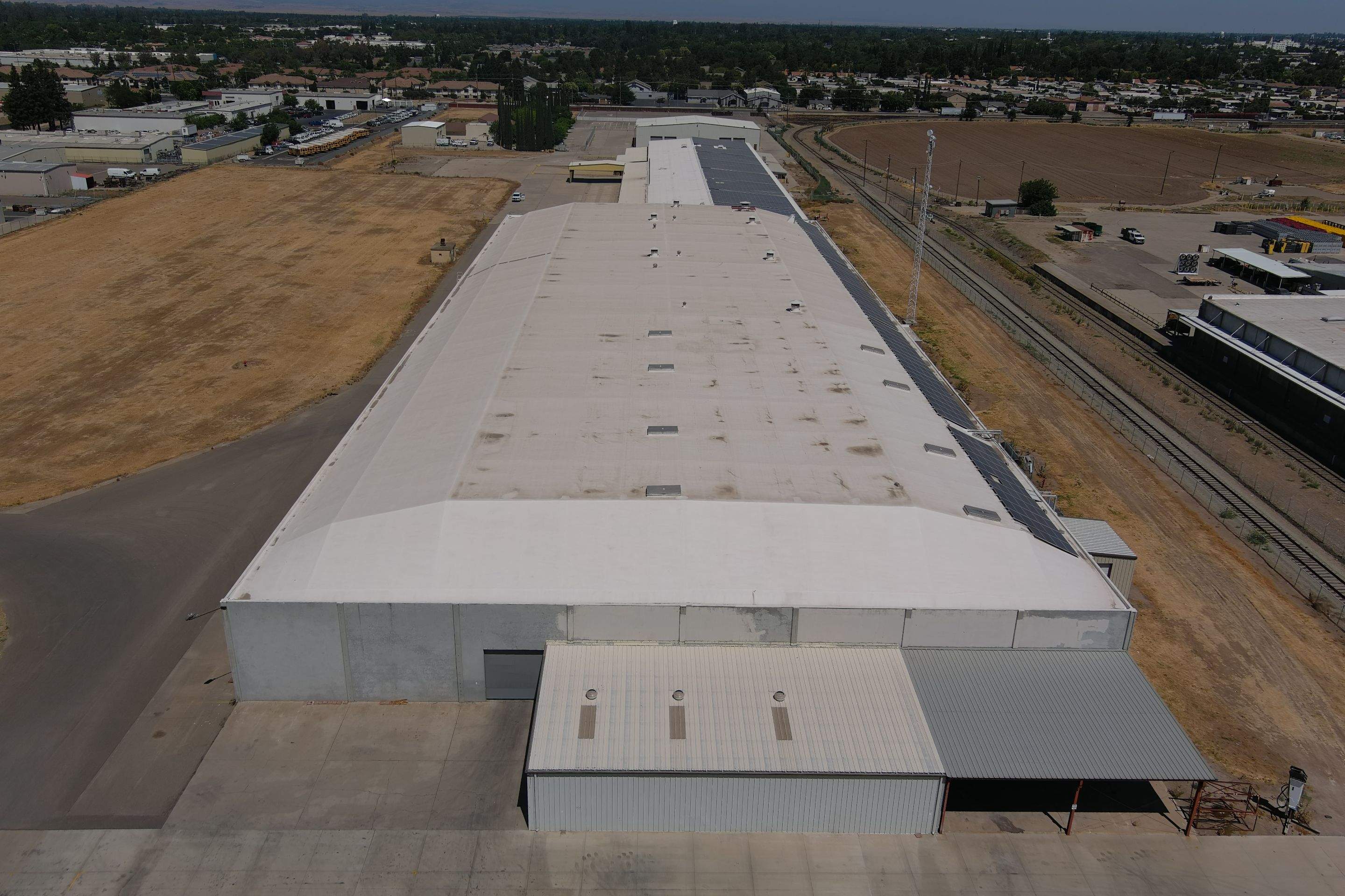 Single-ply restoration system using Conklin Benchmark/PUMA XL fabric and coating by Straight Edge Roofing Inc