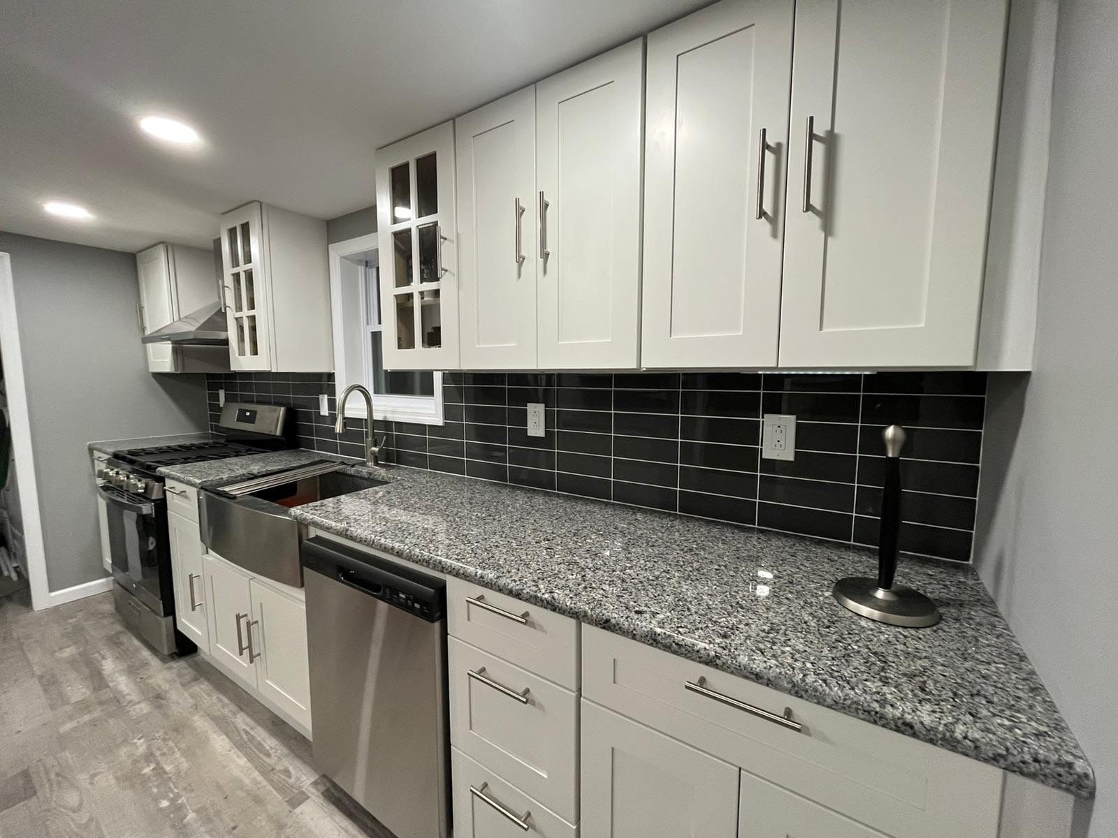 Kitchen Remodel using White Shaker by Home Concepts Construction