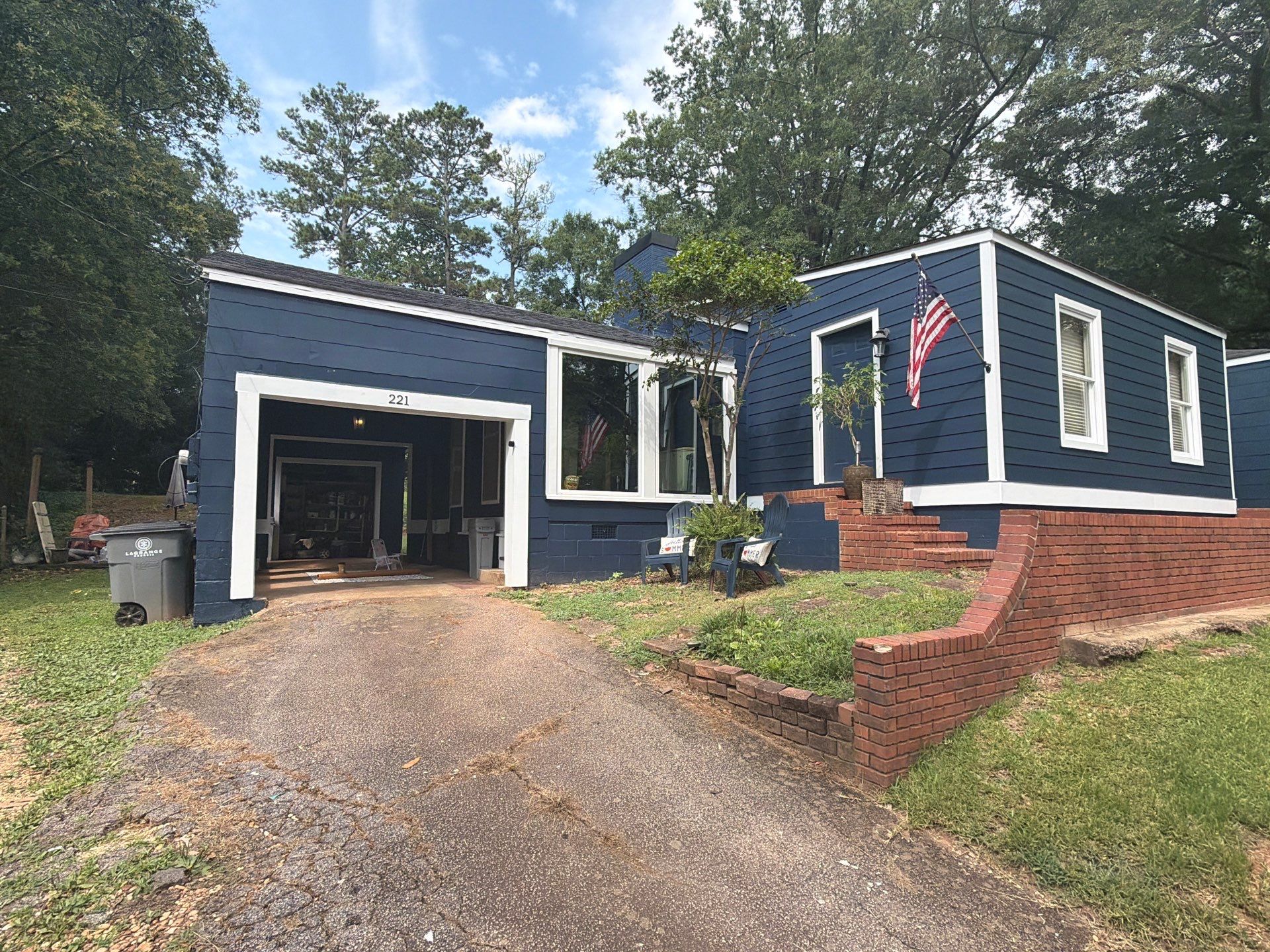 Full Exterior Repaint with Navy Blue and White Trim by Swift Home Renovations