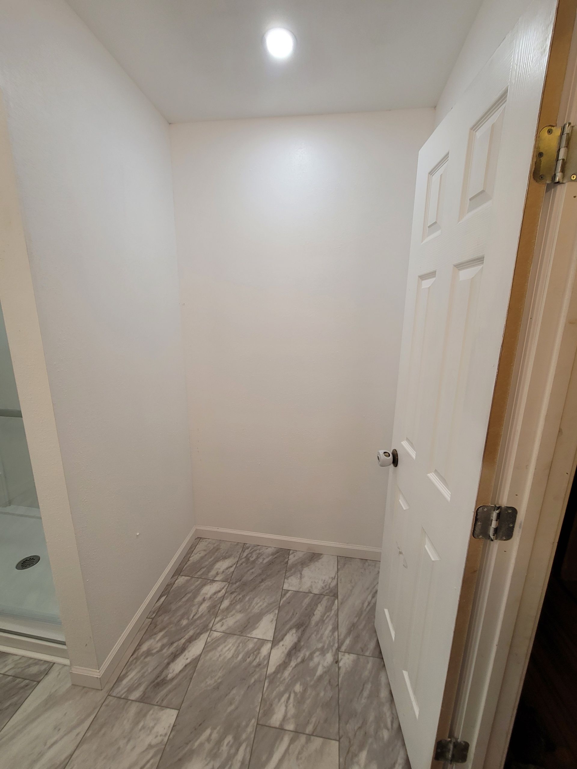 Corner tub to large shower by The Shower Company