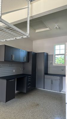 Lori H. upgrade her garage with cabinets and overhead racks